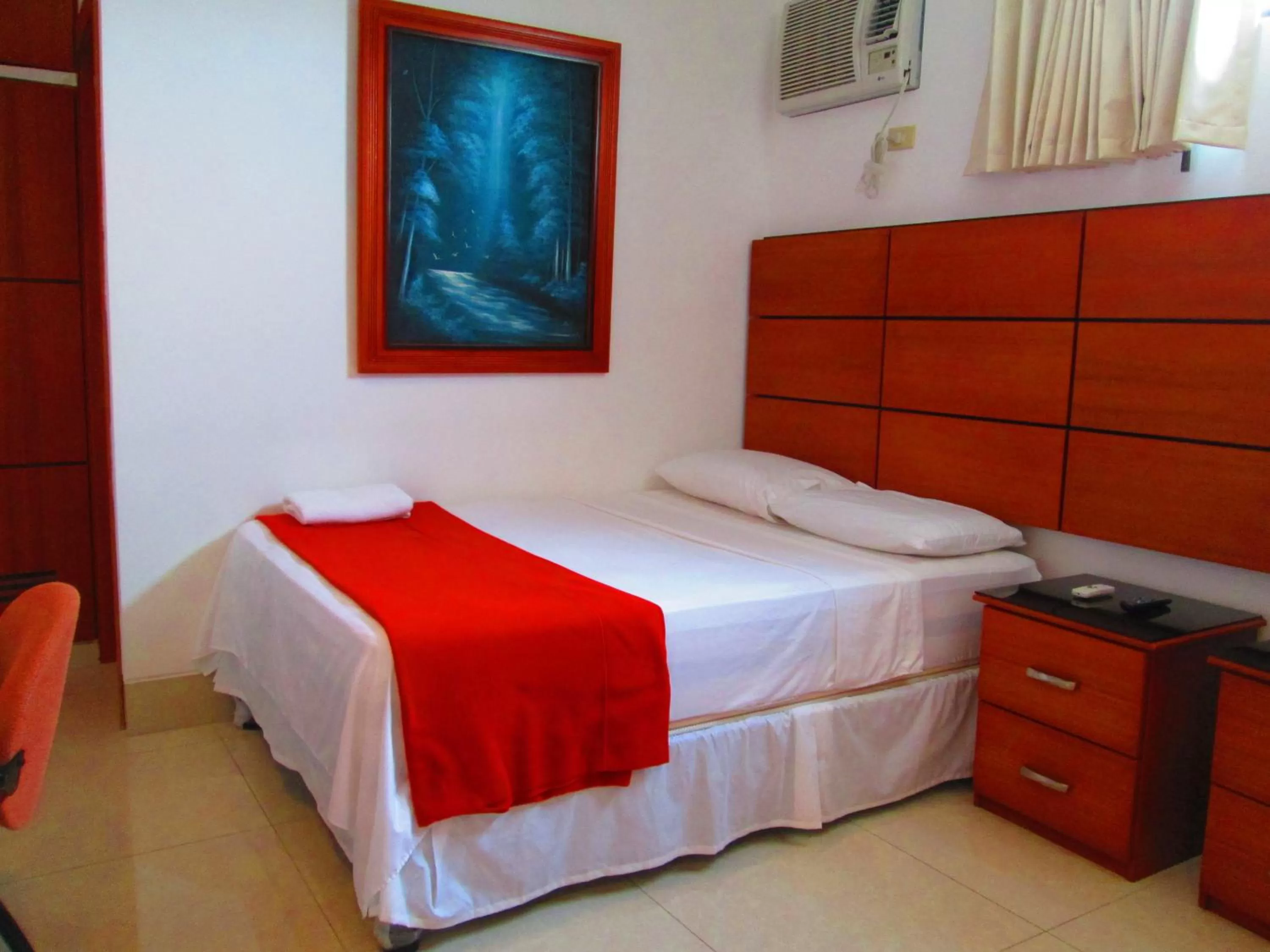 Photo of the whole room, Bed in Hotel Apart Guayaquil Aeropuerto