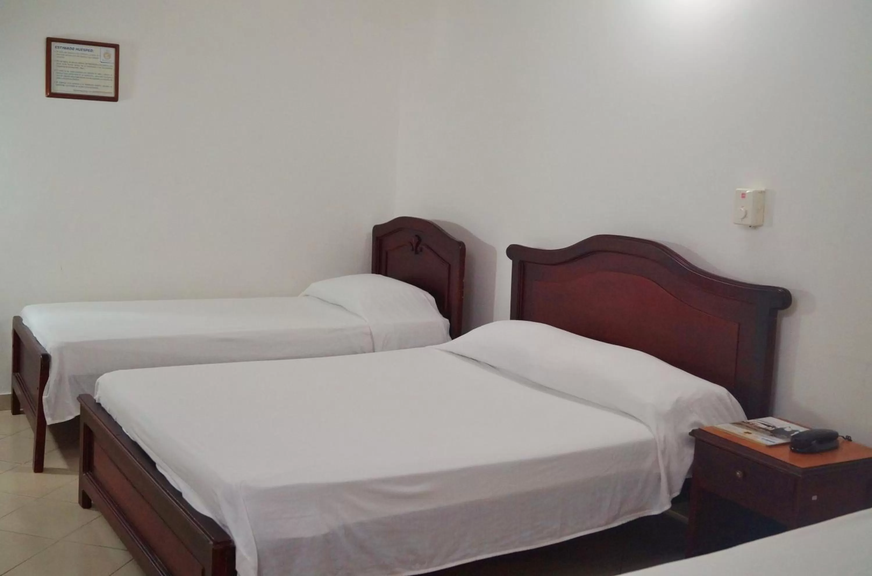 Bed, Room Photo in Hotel Comercial