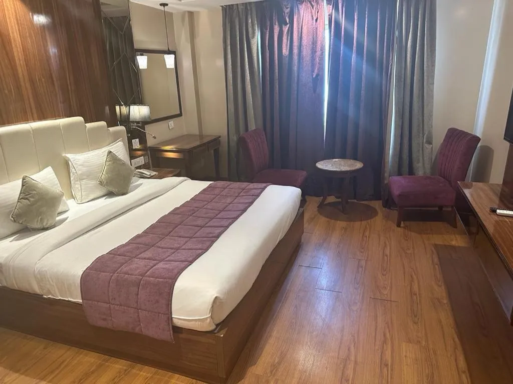 Bed in Airport Hotel Ramhan Palace Mahipalpur