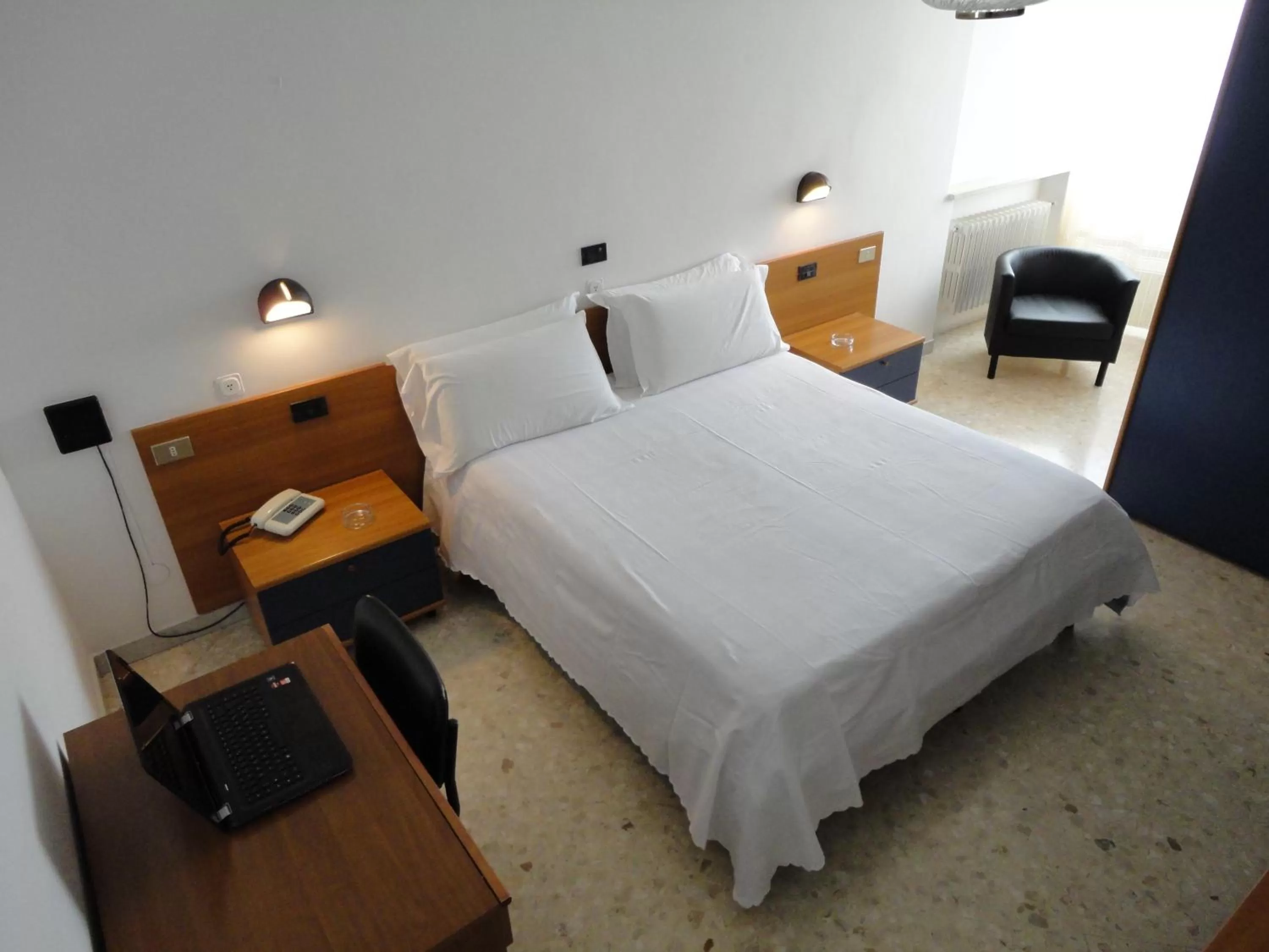 Bed in Hotel Riviera