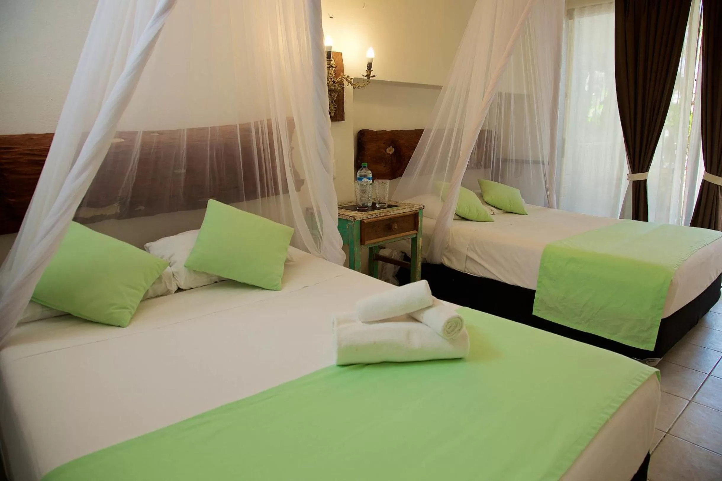 Bed in Punta Piedra Beach Posada