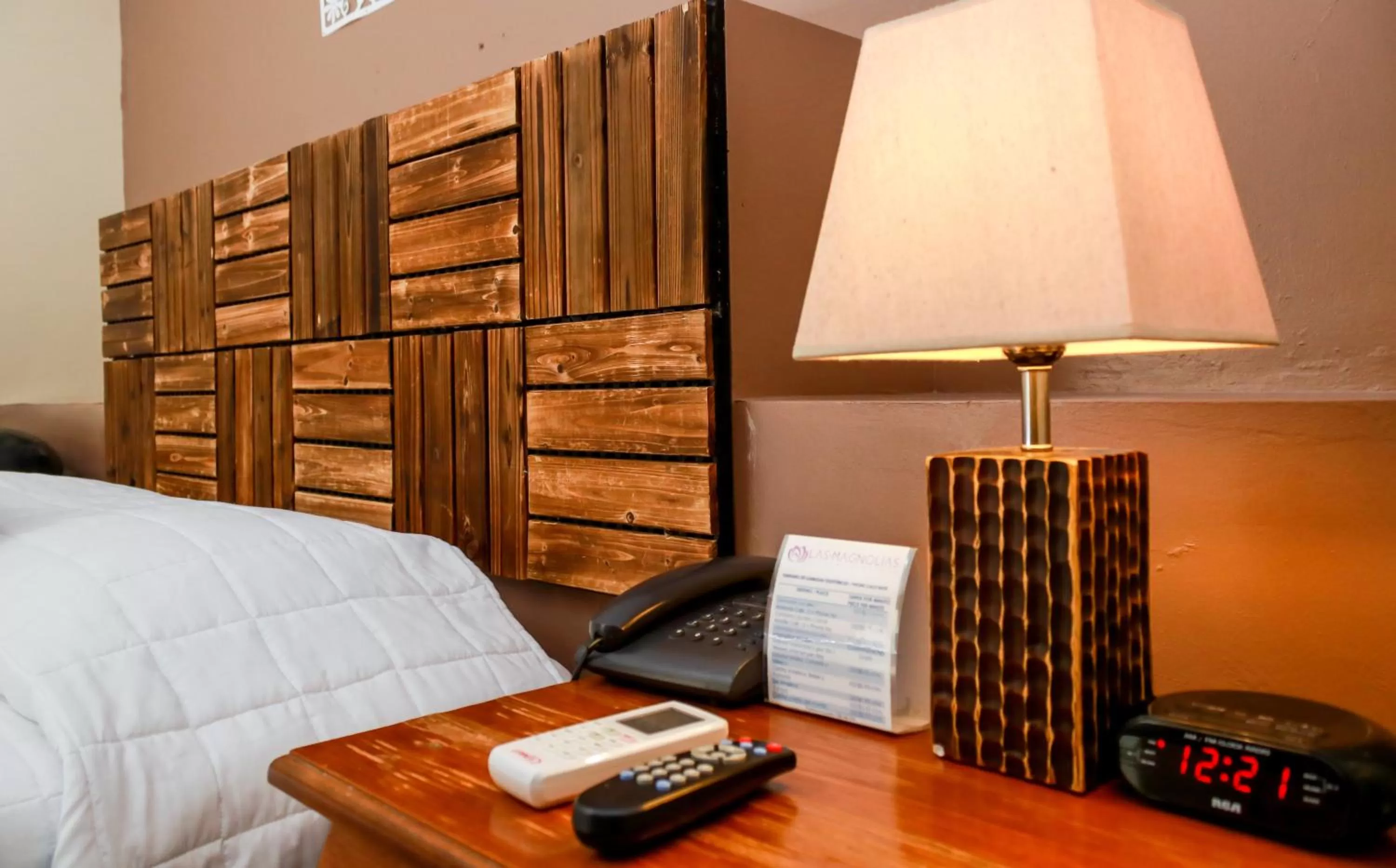 Bed in Las Magnolias Hotel Boutique