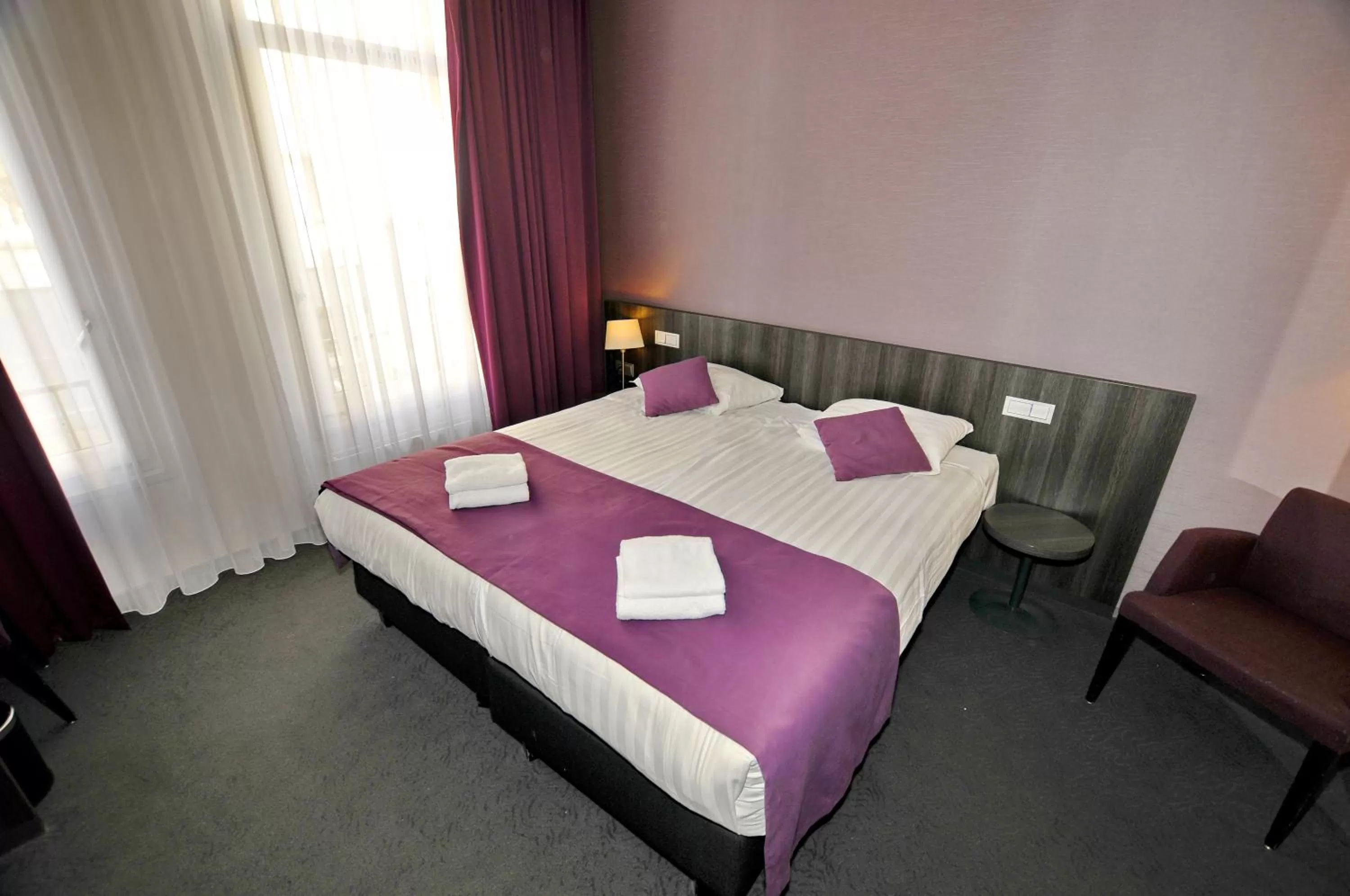 Bed in Hotel Parkview