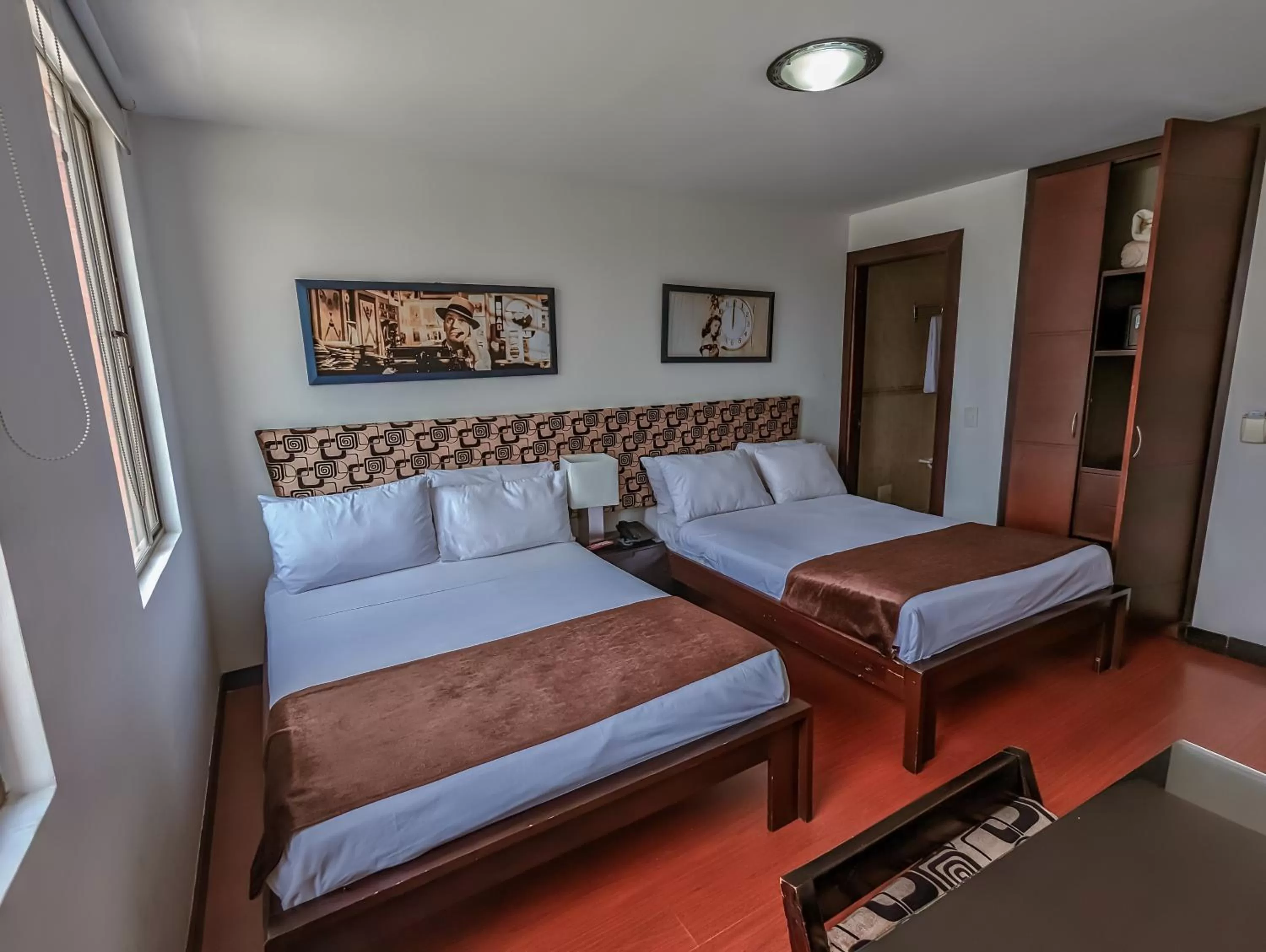 Bed in Hotel Charlotte Suite 26