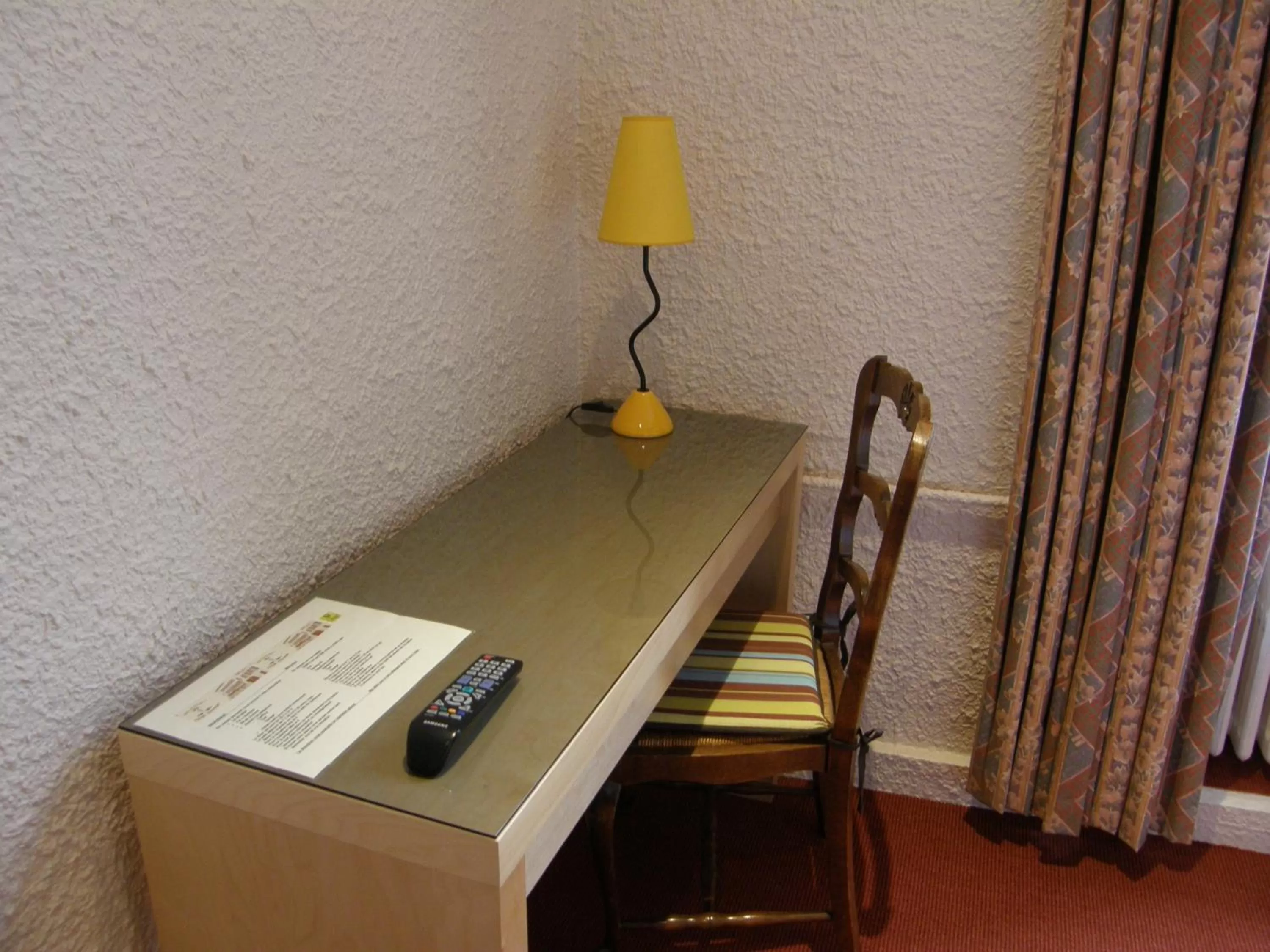 Seating area in Logis Hotel L'ange Couronne