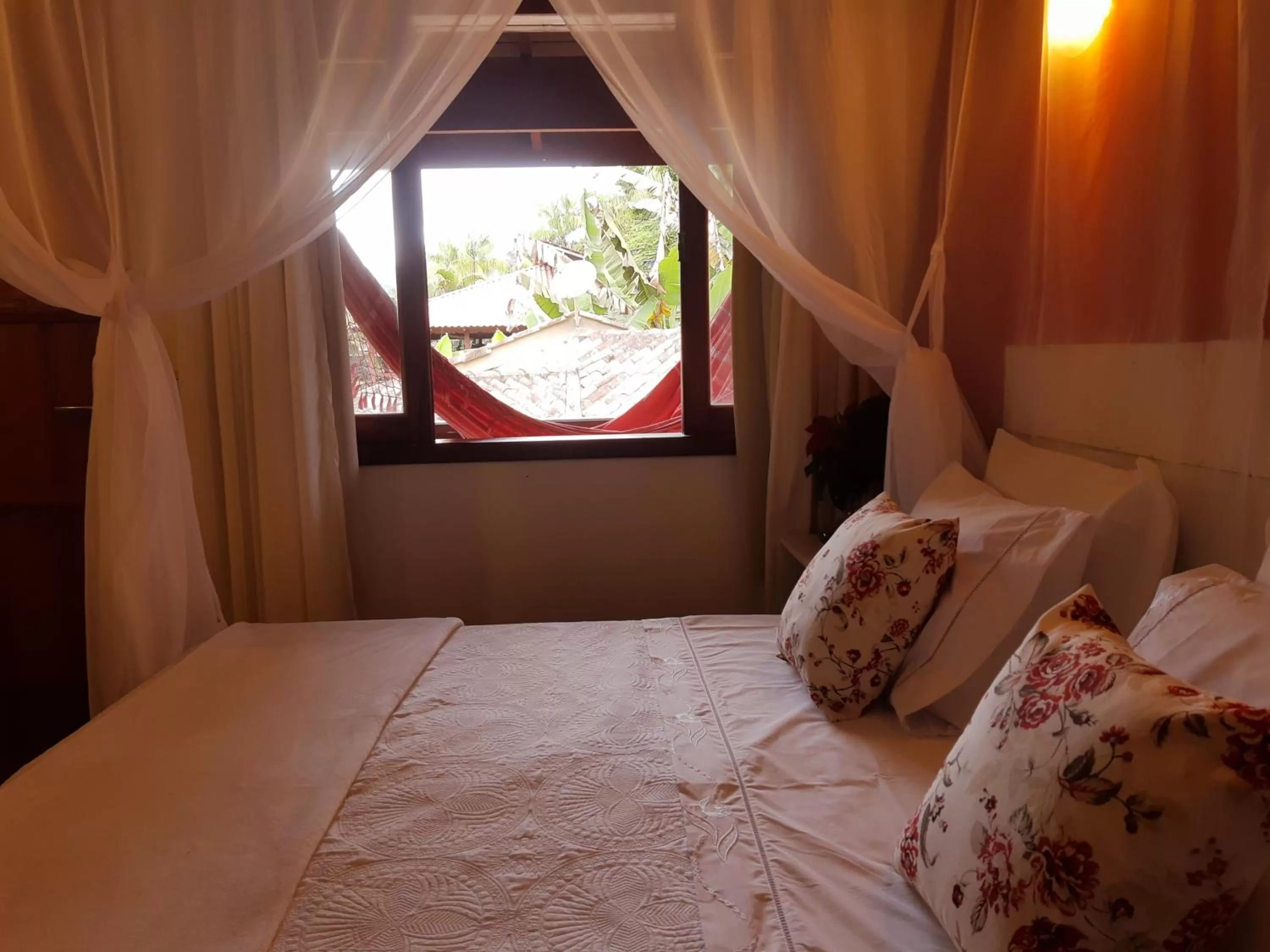 Bed in Magias de Paraty Ecopousada