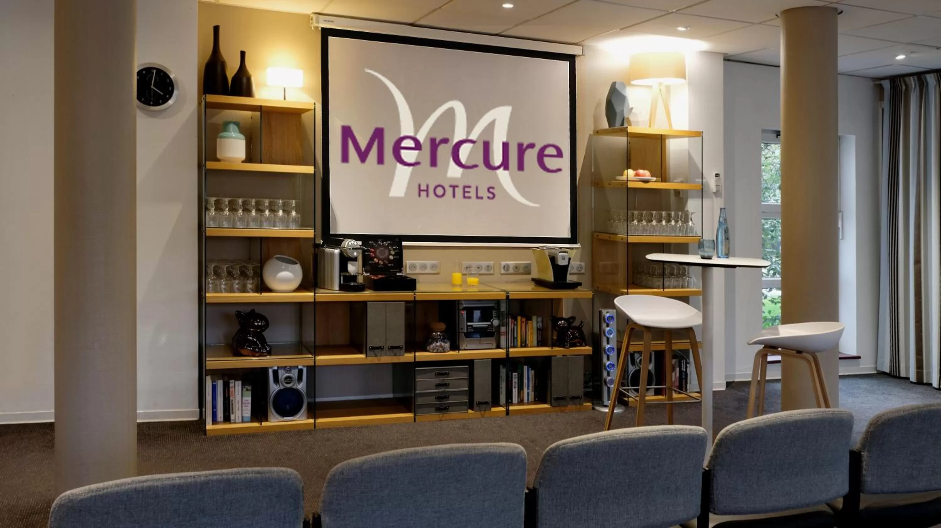 Communal lounge/ TV room in Mercure Hotel Forbach Centre de Loisirs