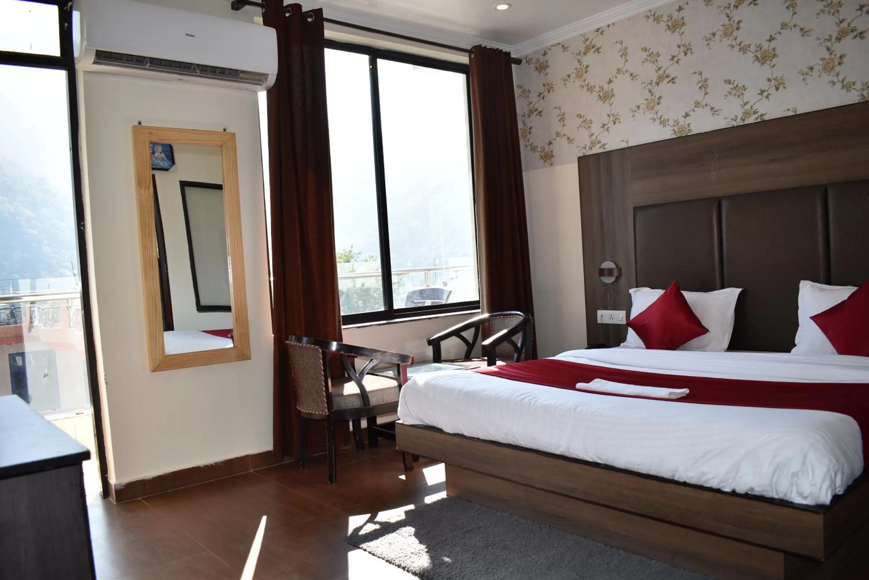 Photo of the whole room, Bed in Tapasthali by Meera Hotels