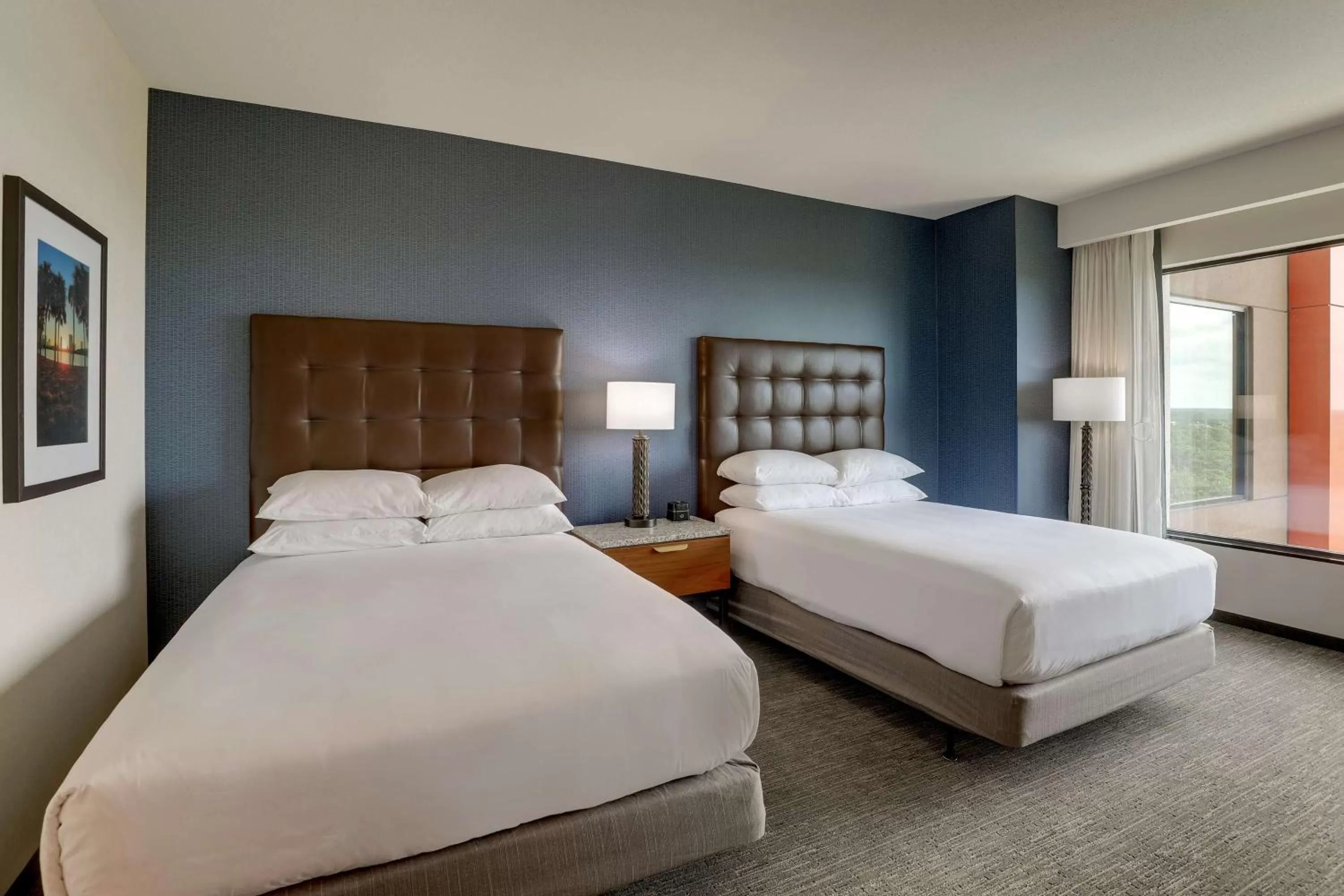 Deluxe Queen Room with Two Queen Beds  -  Hearing Accessible, Tub, Nightly views of area fireworks in Drury Plaza Hotel Orlando - Disney Springs Area