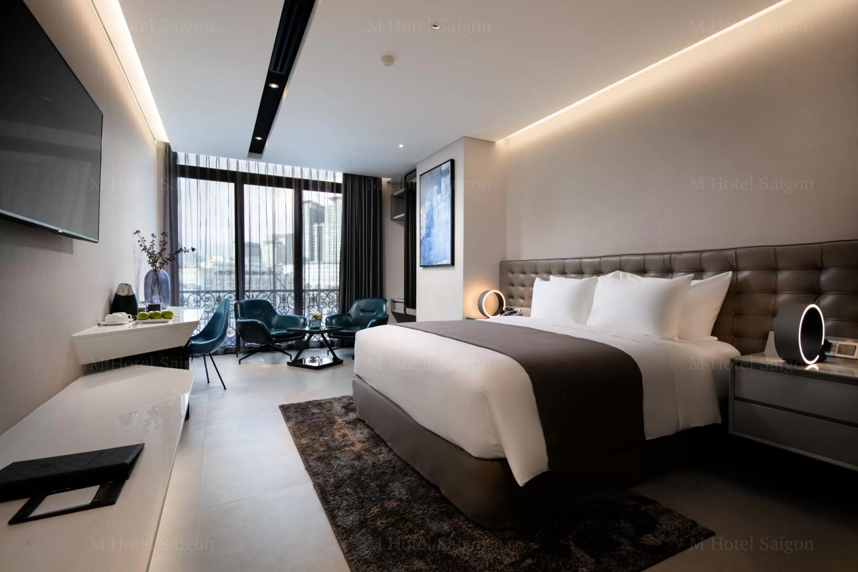 Photo of the whole room, Bed in M Hotel Saigon