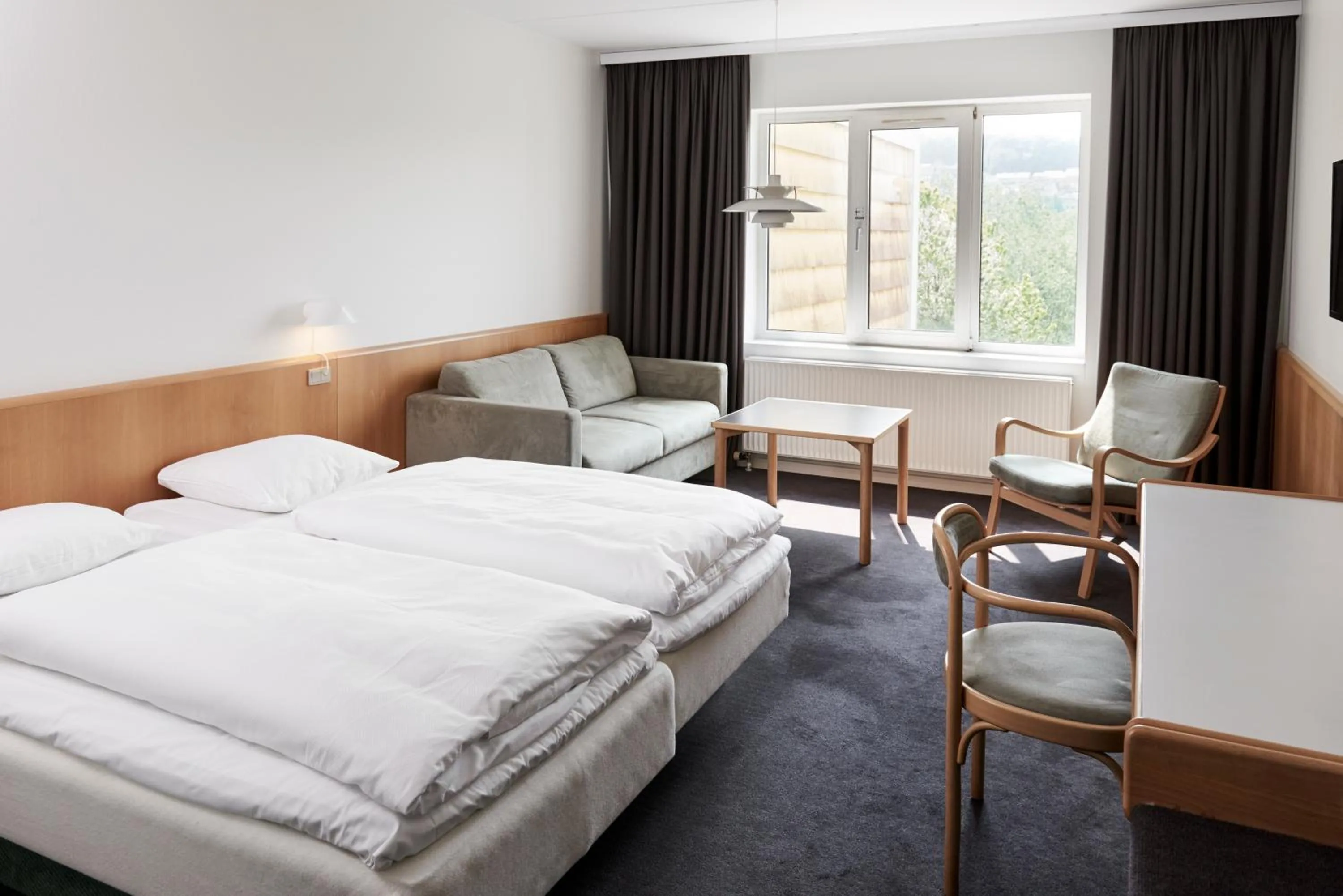 Photo of the whole room, Bed in Milling Hotel Vejle