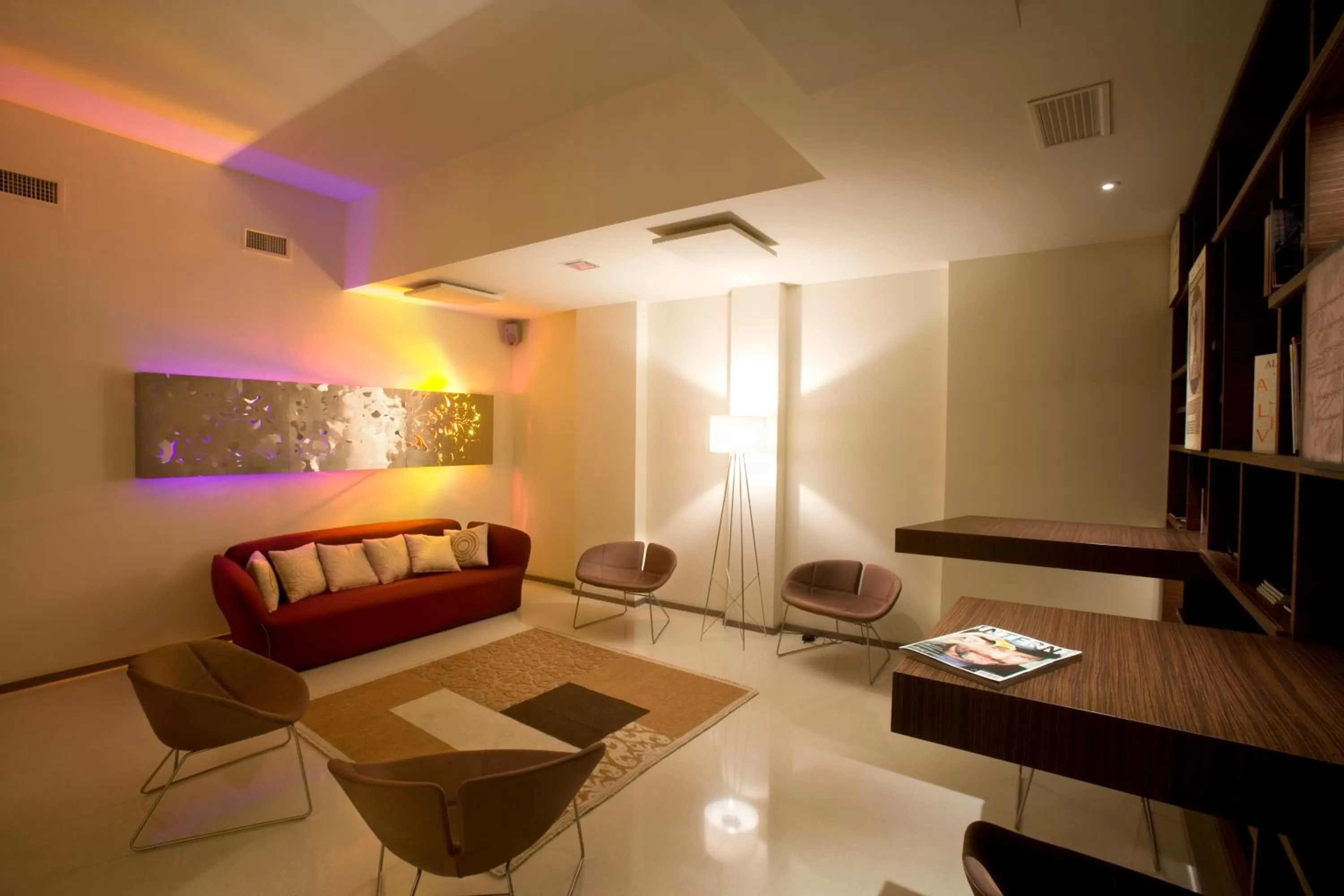 Communal lounge/ TV room in Eos Hotel