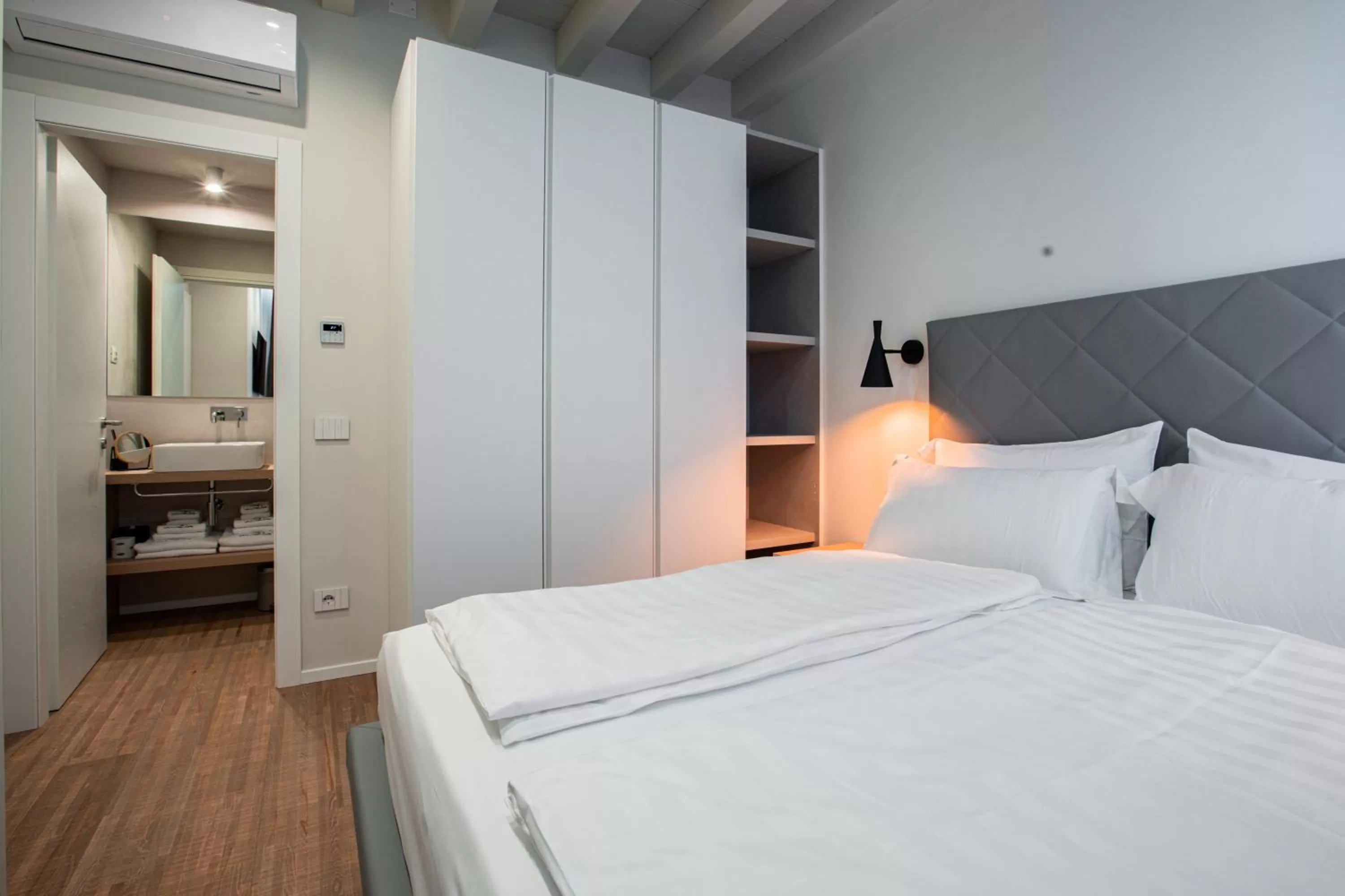 Bed in Ah Villaglori Boutique Apartments