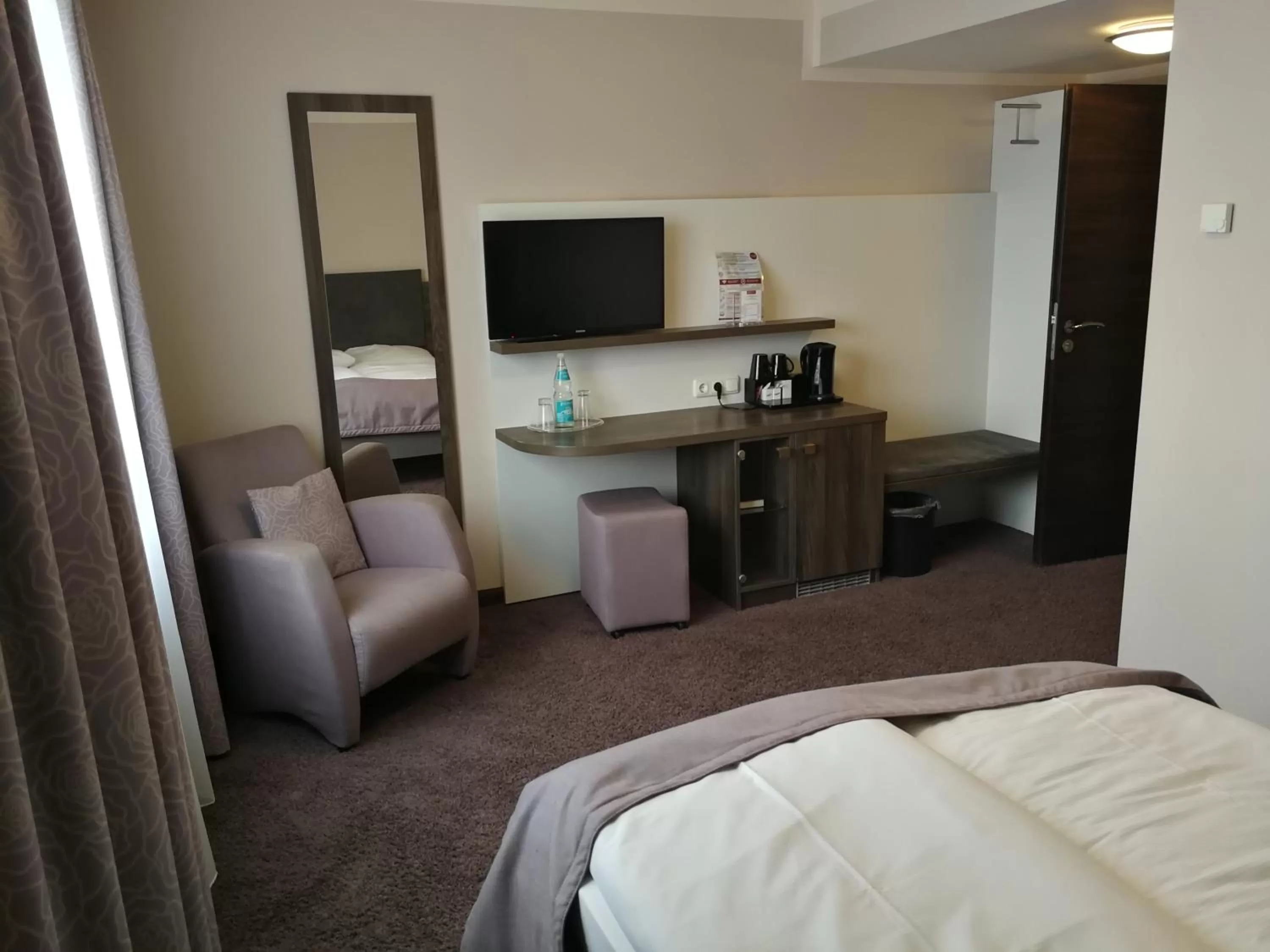 Photo of the whole room, Bed in TRIP INN PostHotel Düren