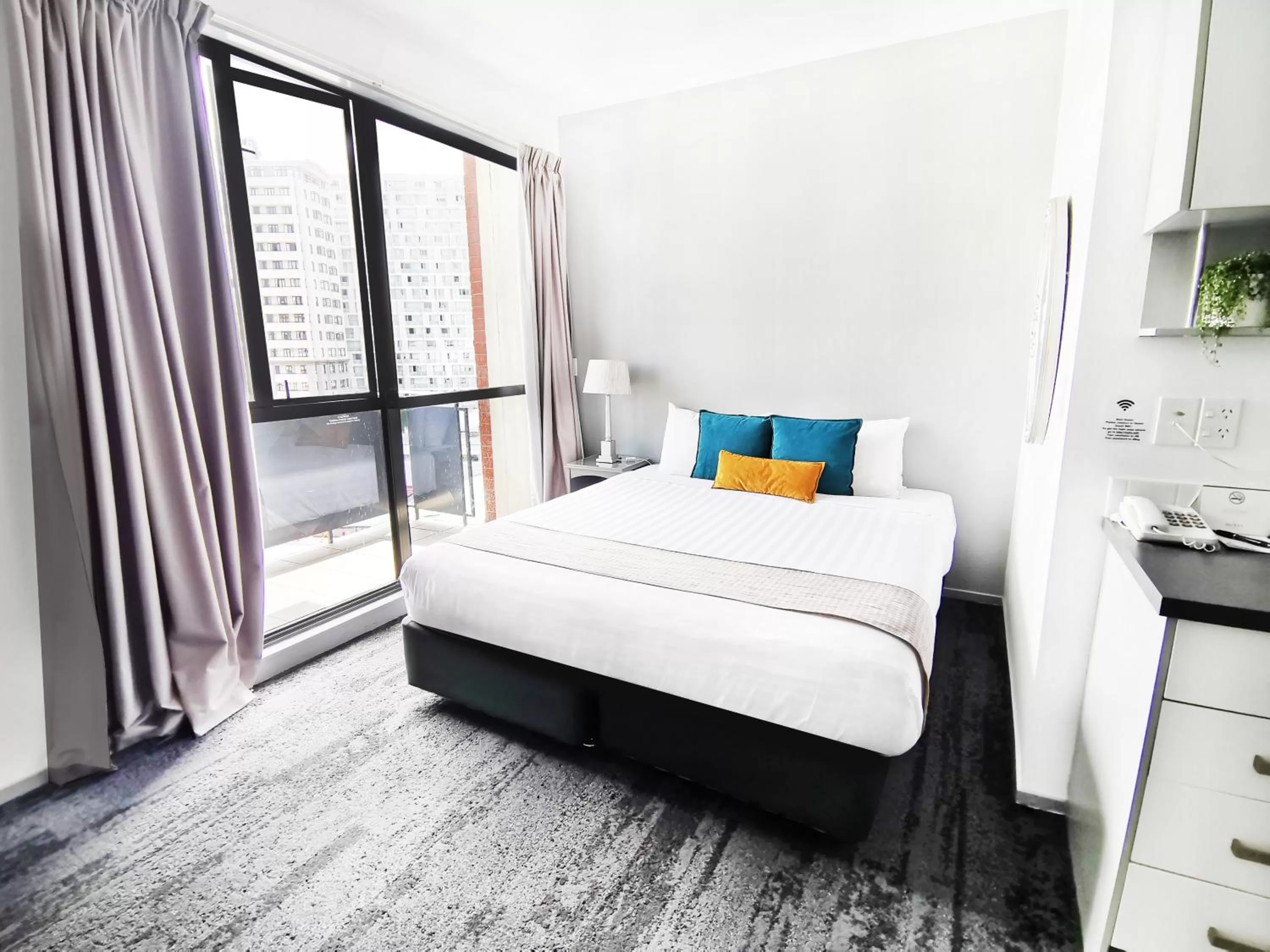 Bed in Quest on Eden Auckland CBD Apartment Hotel