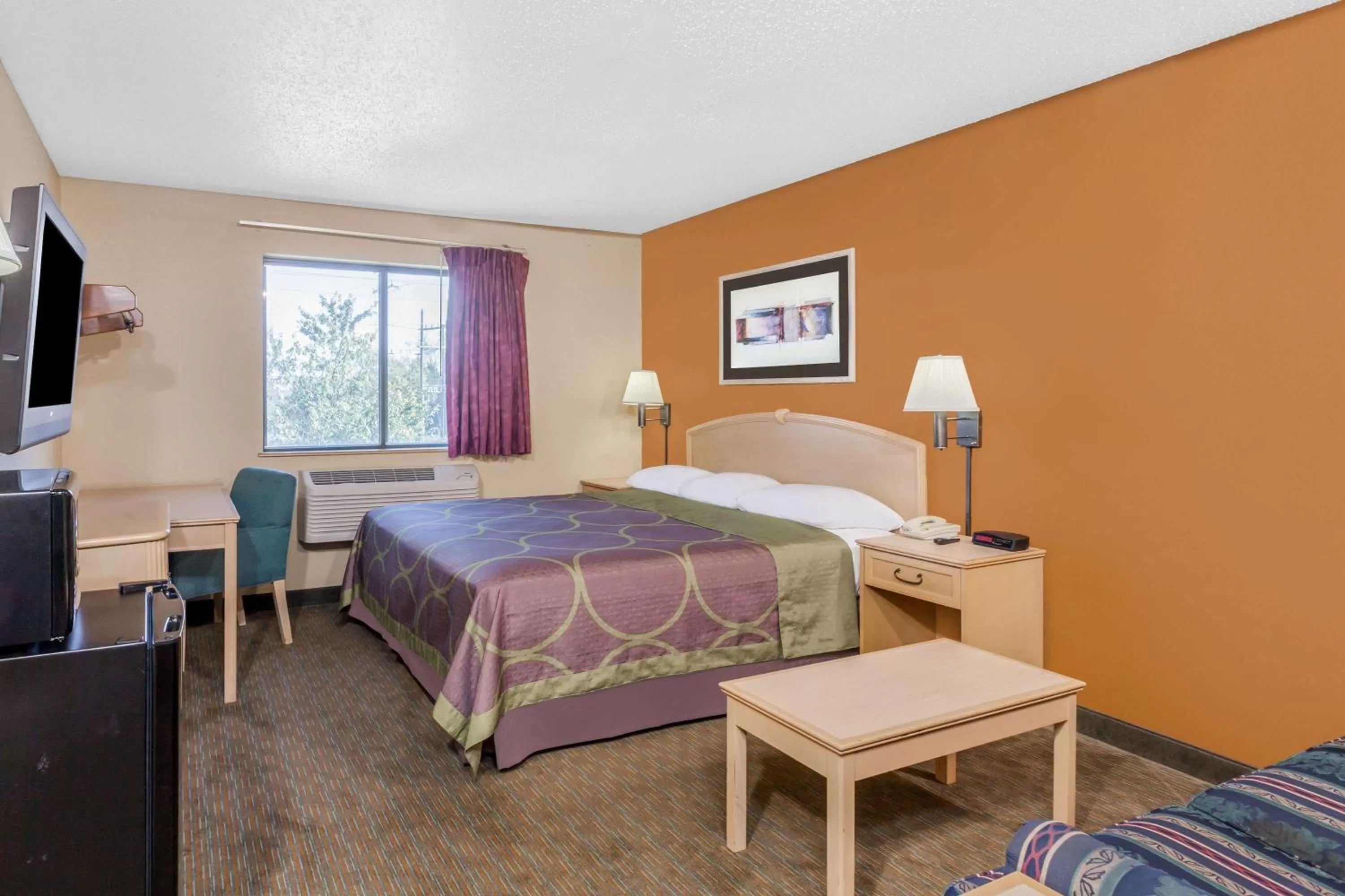 Photo of the whole room in Super 8 by Wyndham Charlotte/Amusement Park Area
