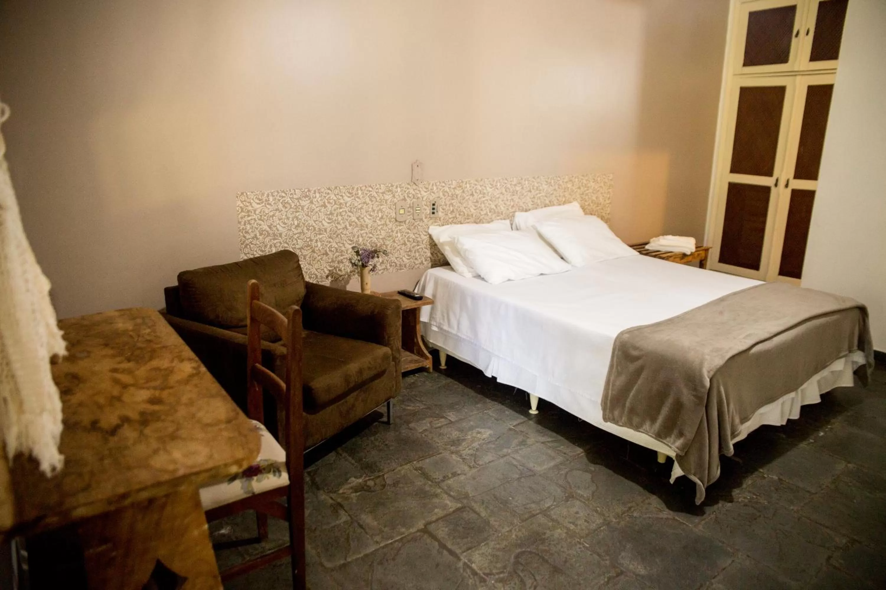 Bed in Pousada Flor da Serra