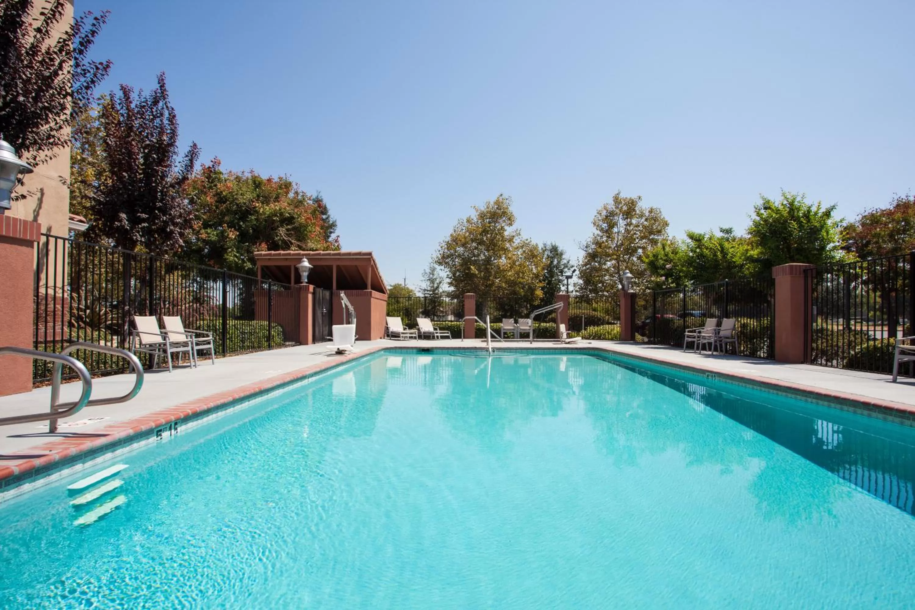 Swimming pool in Holiday Inn Express Davis-University Area by IHG