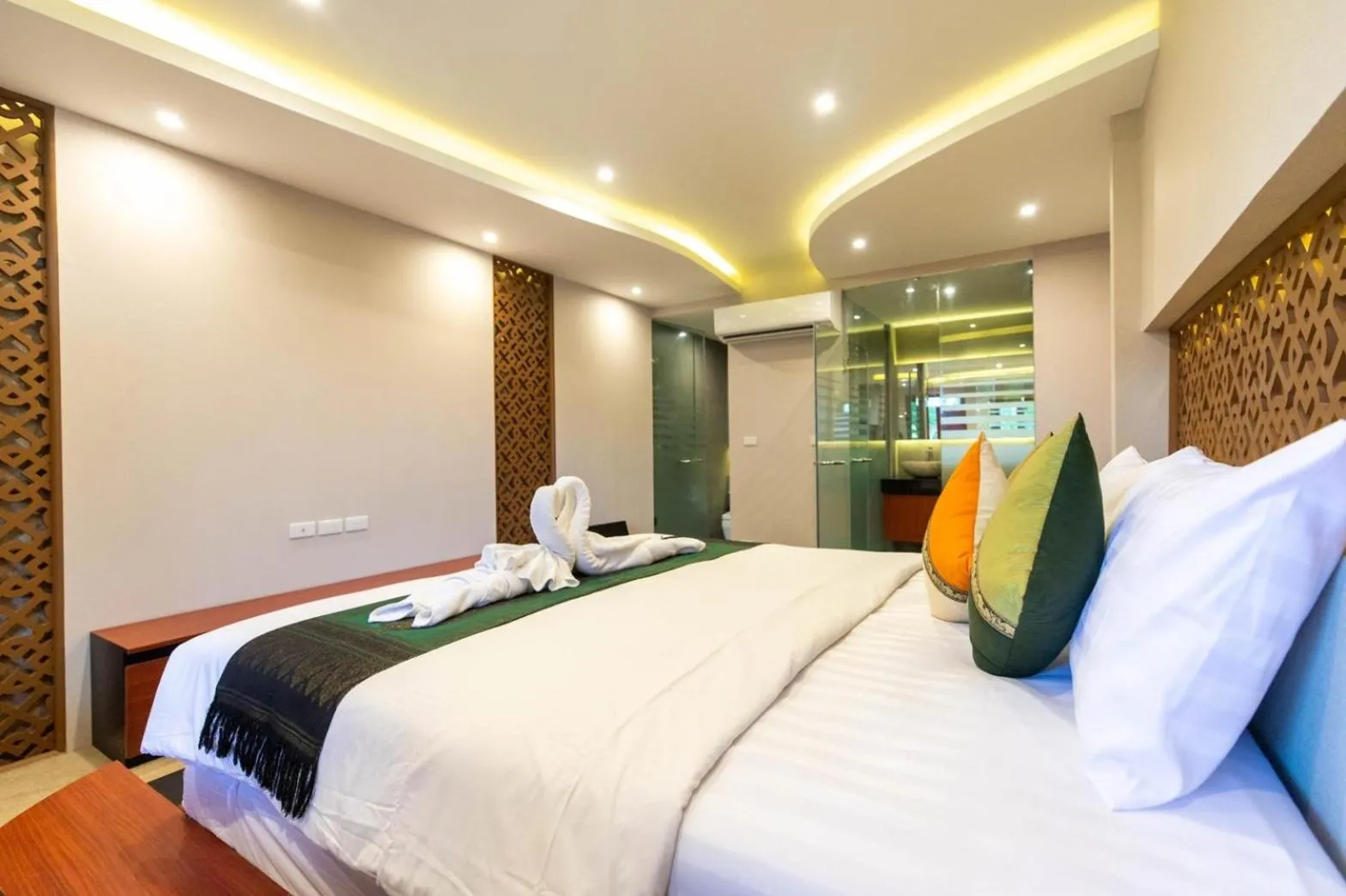 Bedroom, Bed in Royal Phawadee Village Patong - 2 Minutes walk to the beach