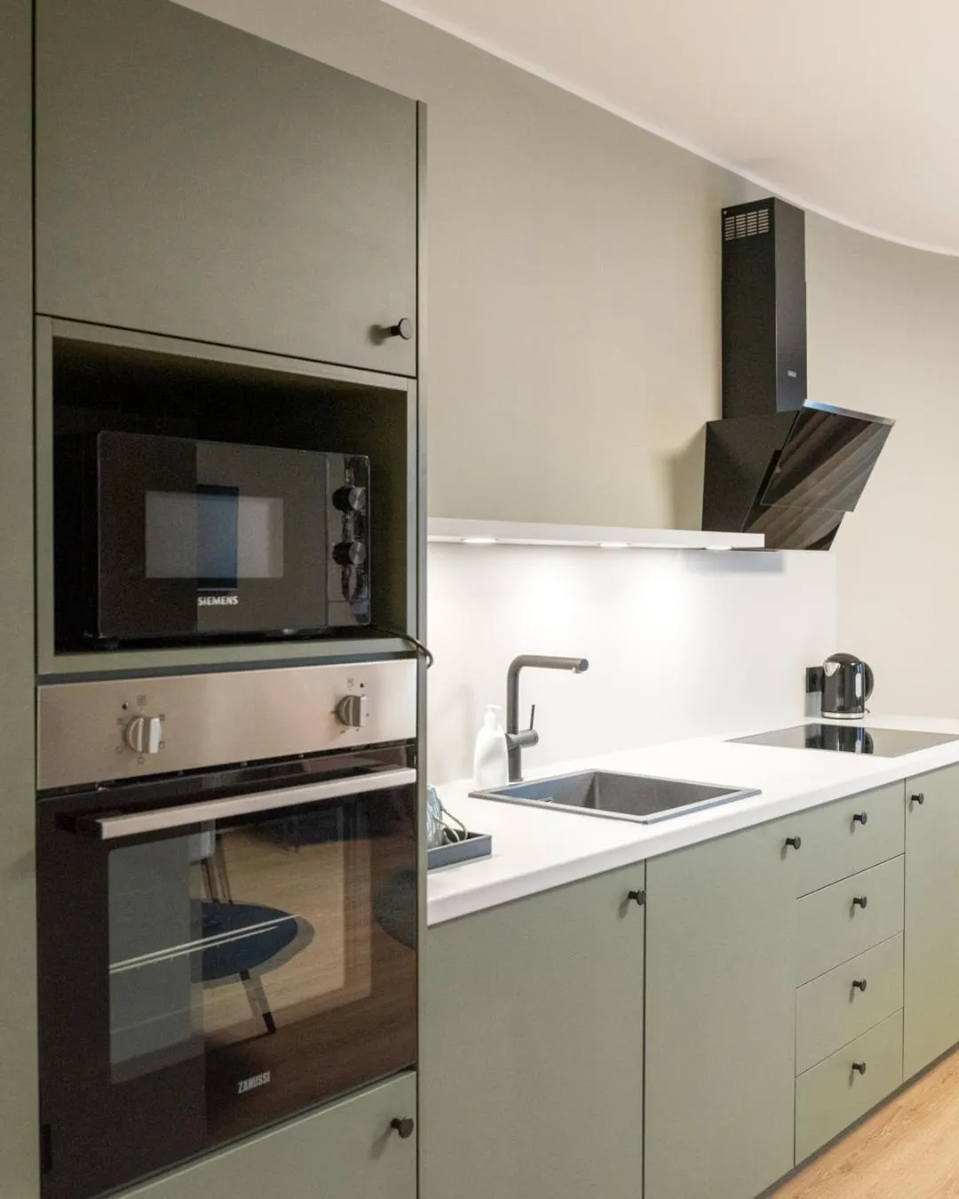 Kitchen or kitchenette in KOOS Hotel&Apartments - City Aparthotel