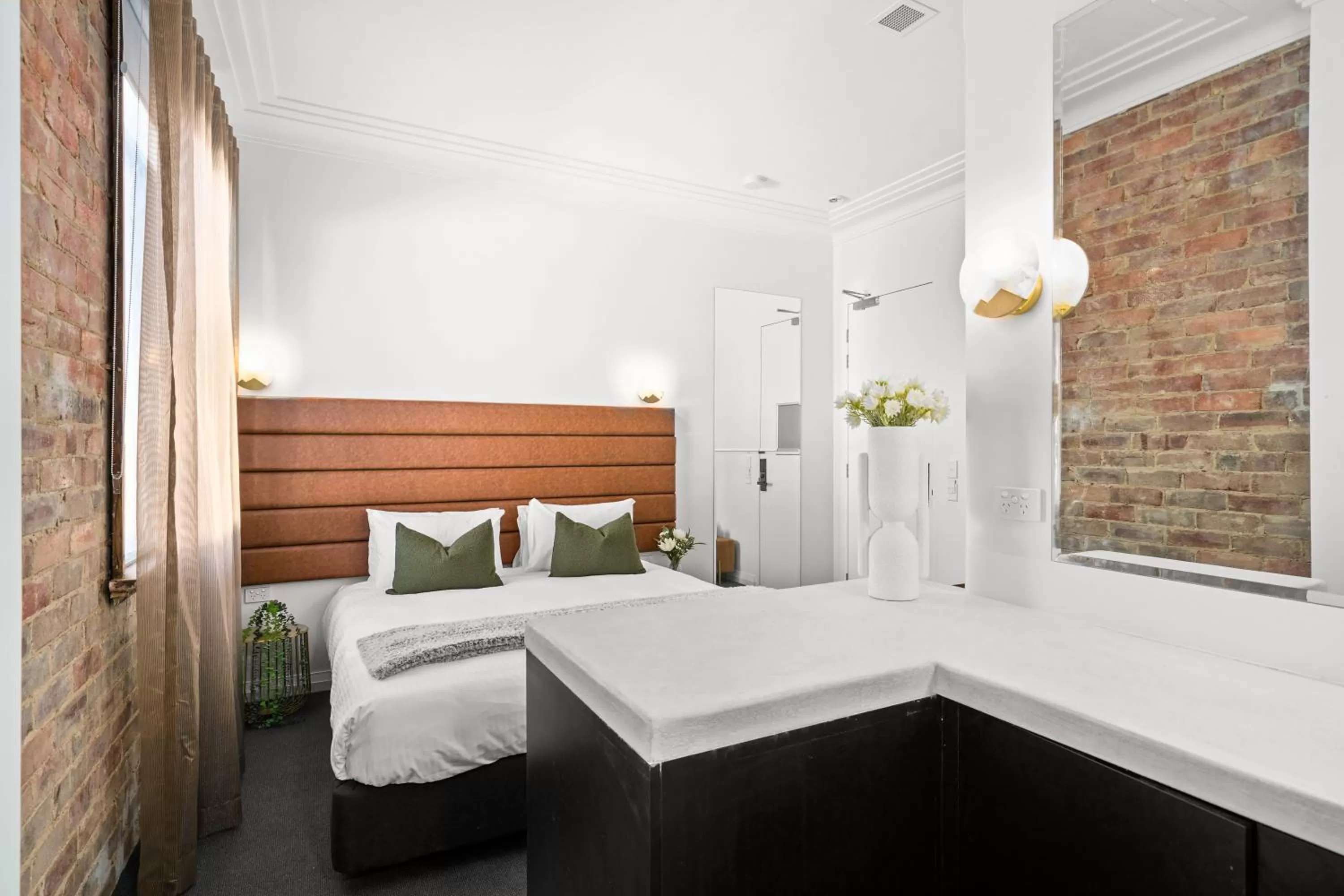 Bed in Grand Hotel and Studios