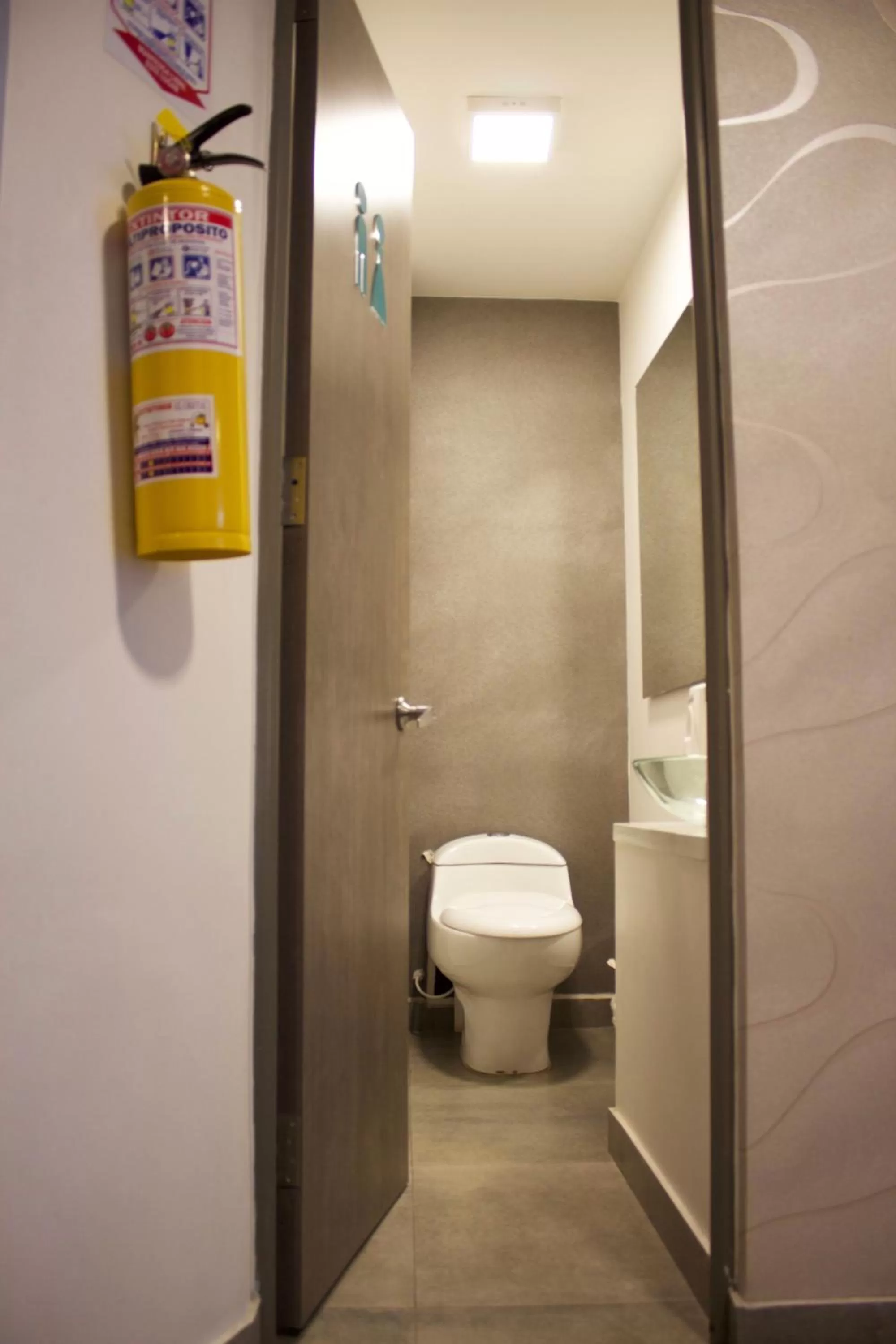 Toilet in Agora Suites Self-Service Boutique Hotel