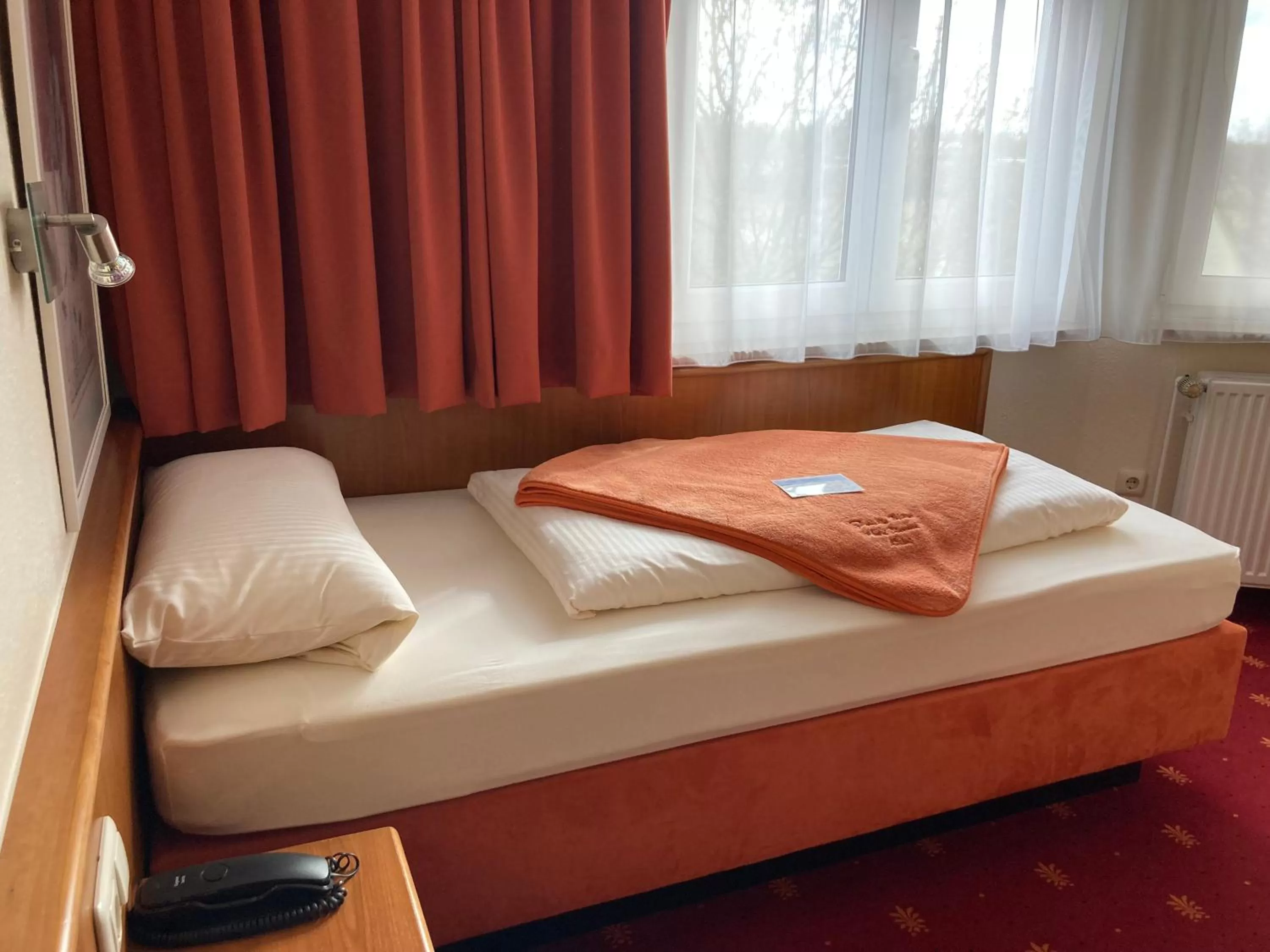 Bed in Hotel Diamant