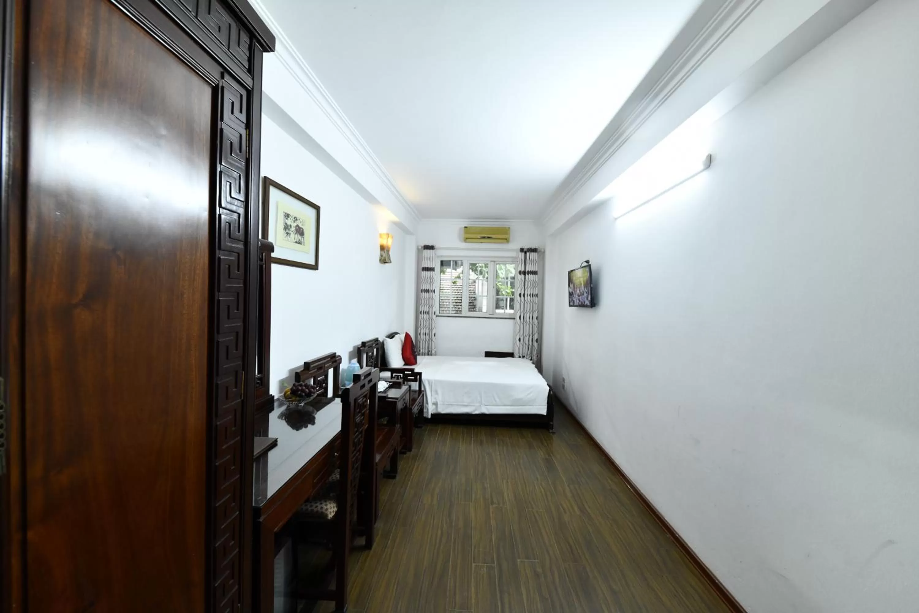 Bed in Phoenix Legend Hotel Hanoi