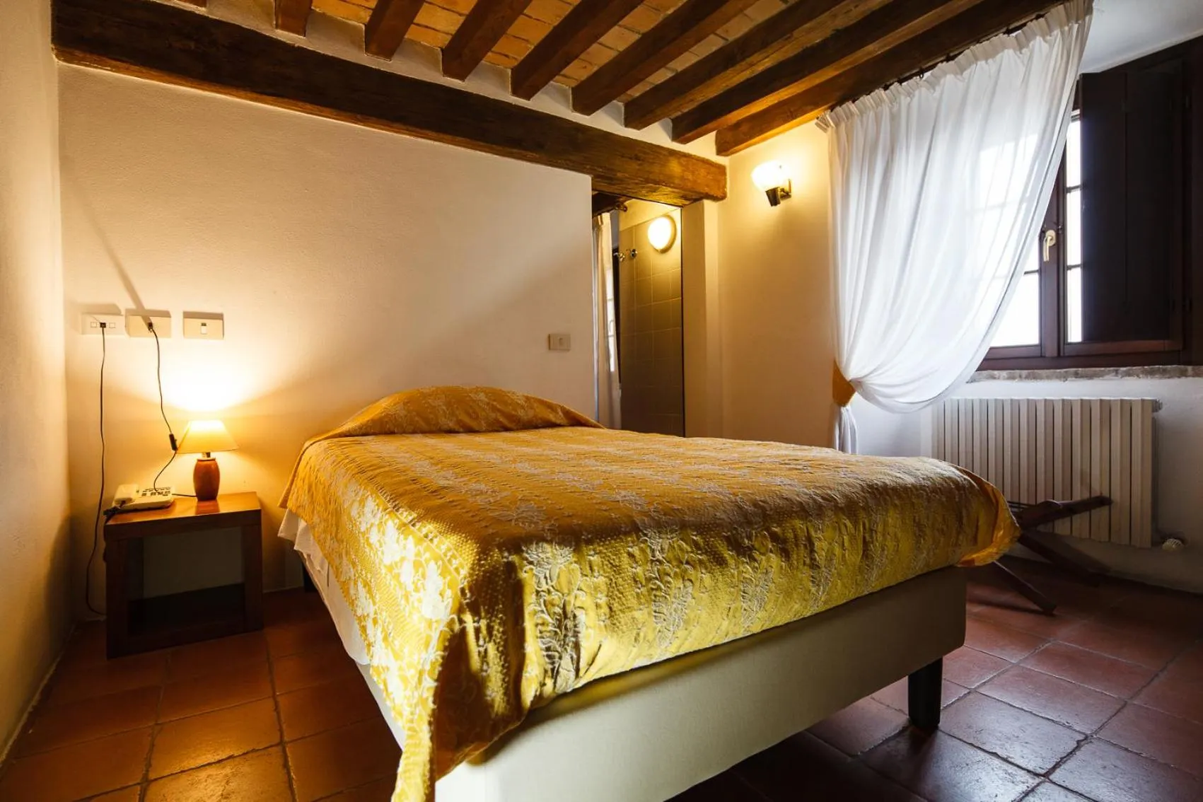 Bed in Relais Fontevivo