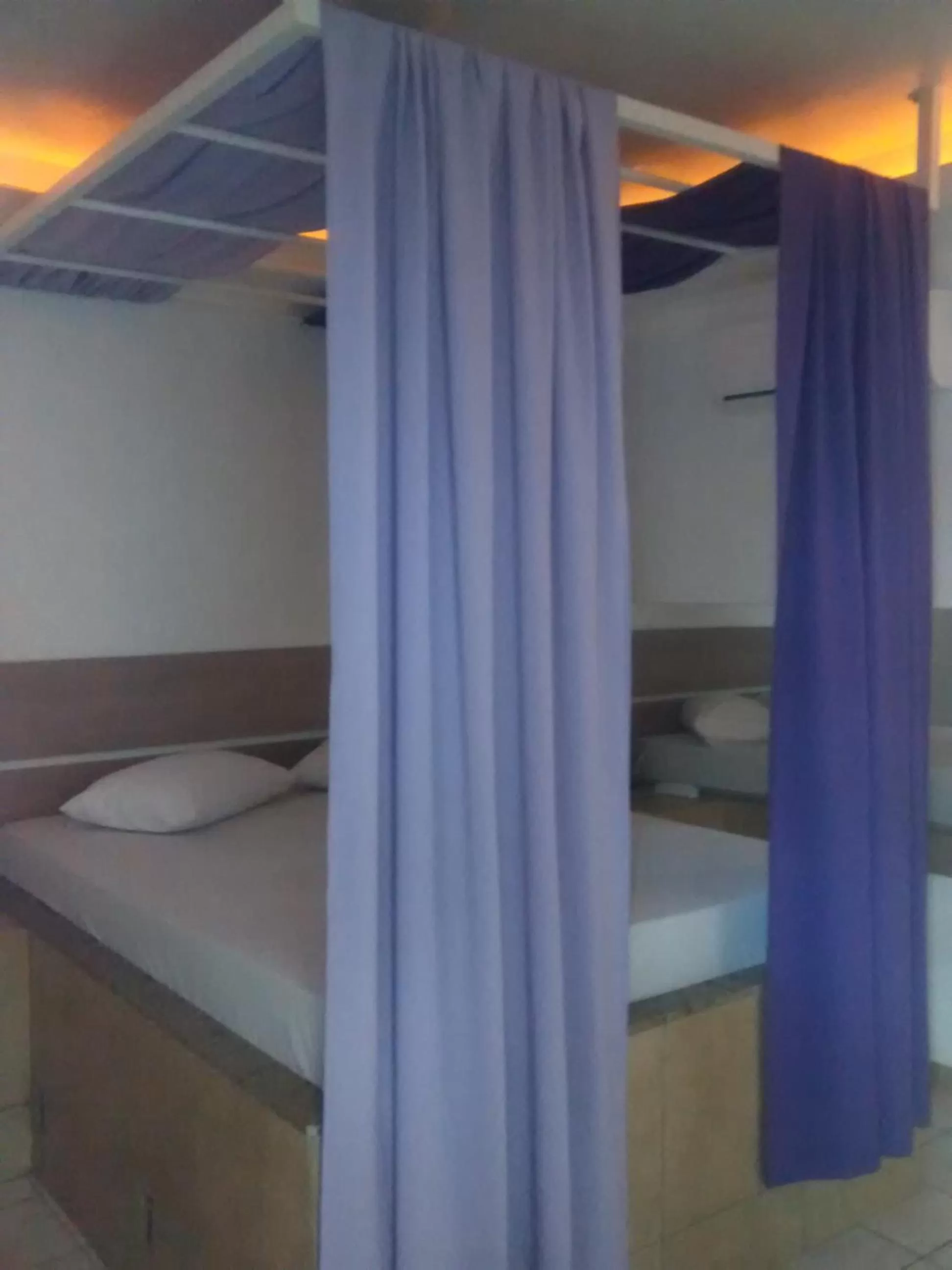 Bedroom in Classic Hotel e Motel