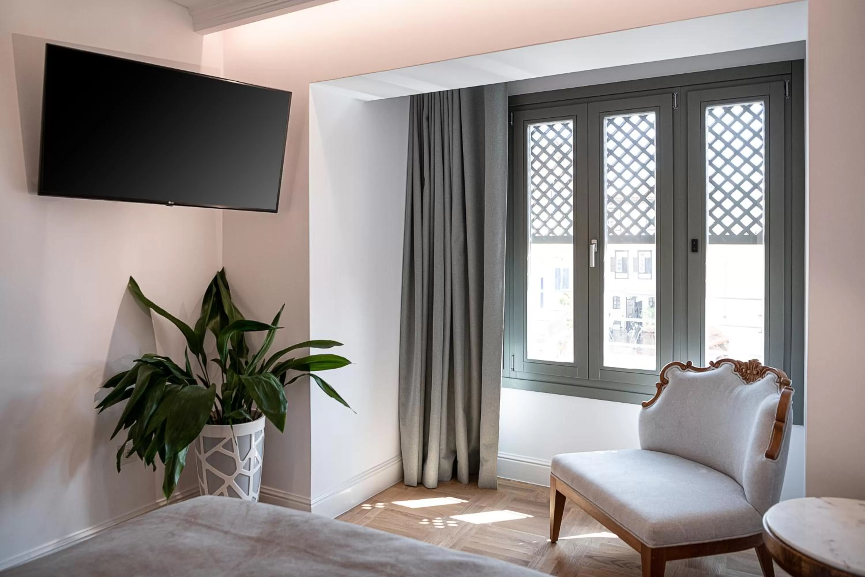 Bed in Ionas Boutique Hotel