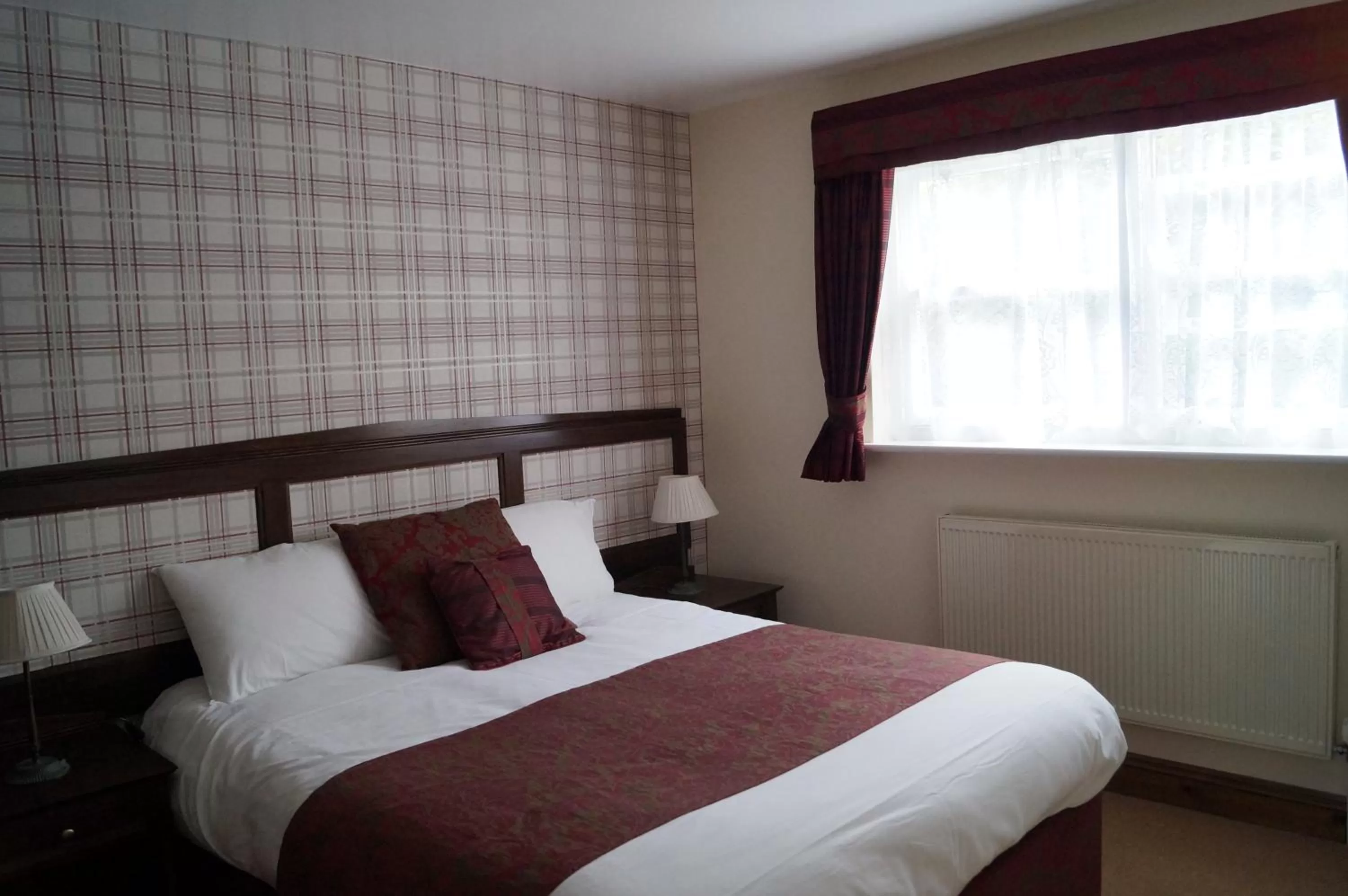 Bed in The Flying Bull Inn