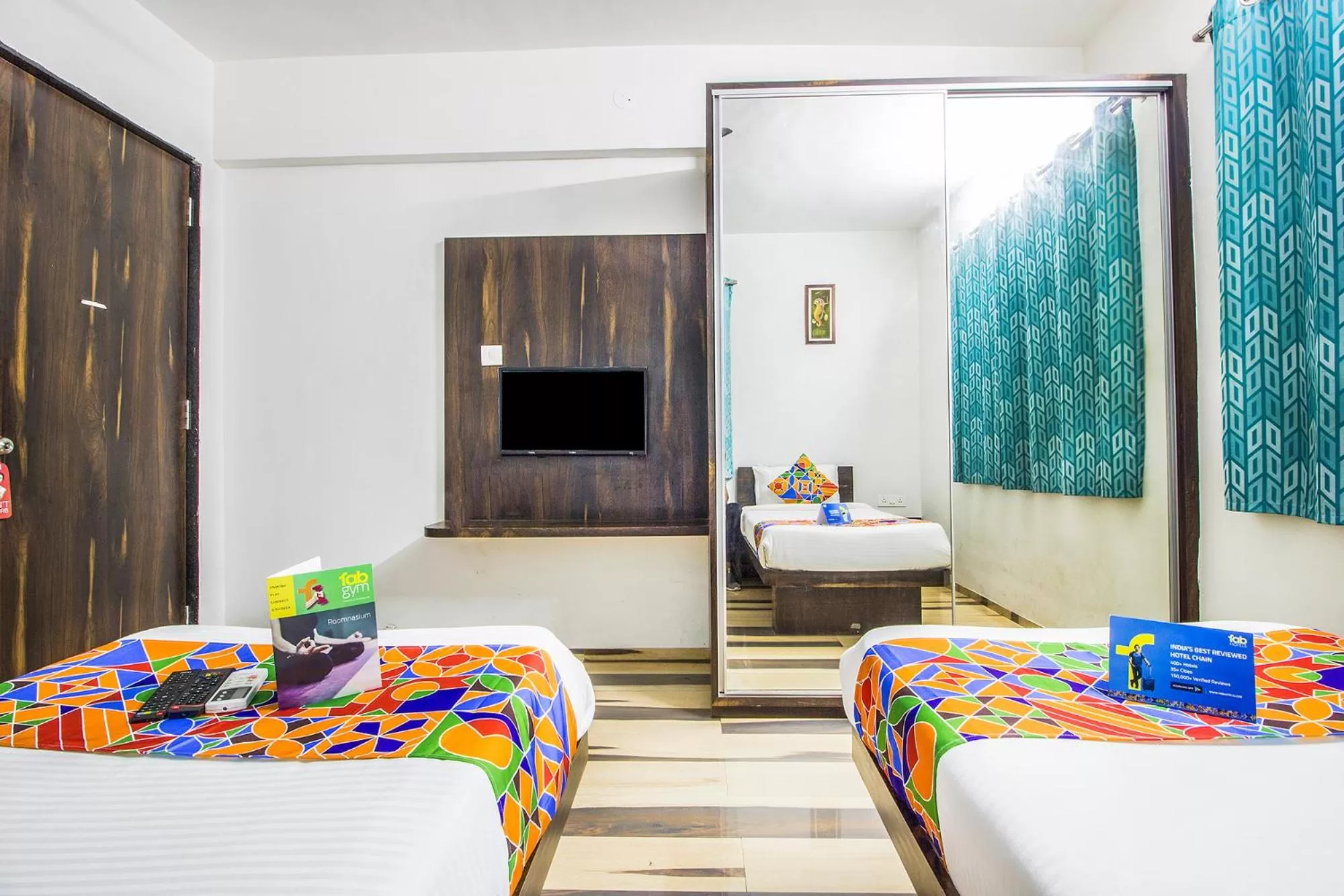 Bedroom, TV/Entertainment Center in FabHotel Pruthamesh Pride