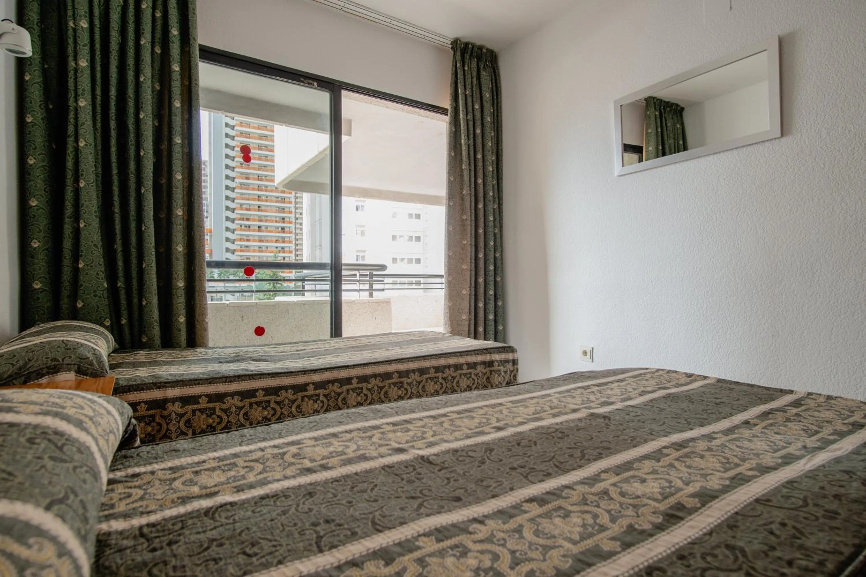 Bed in Luxmar Apartaments