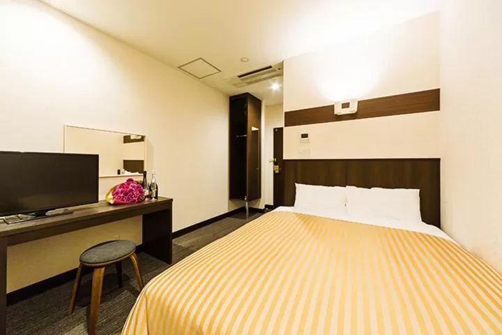 Bed in Hotel CASVI Tenjin