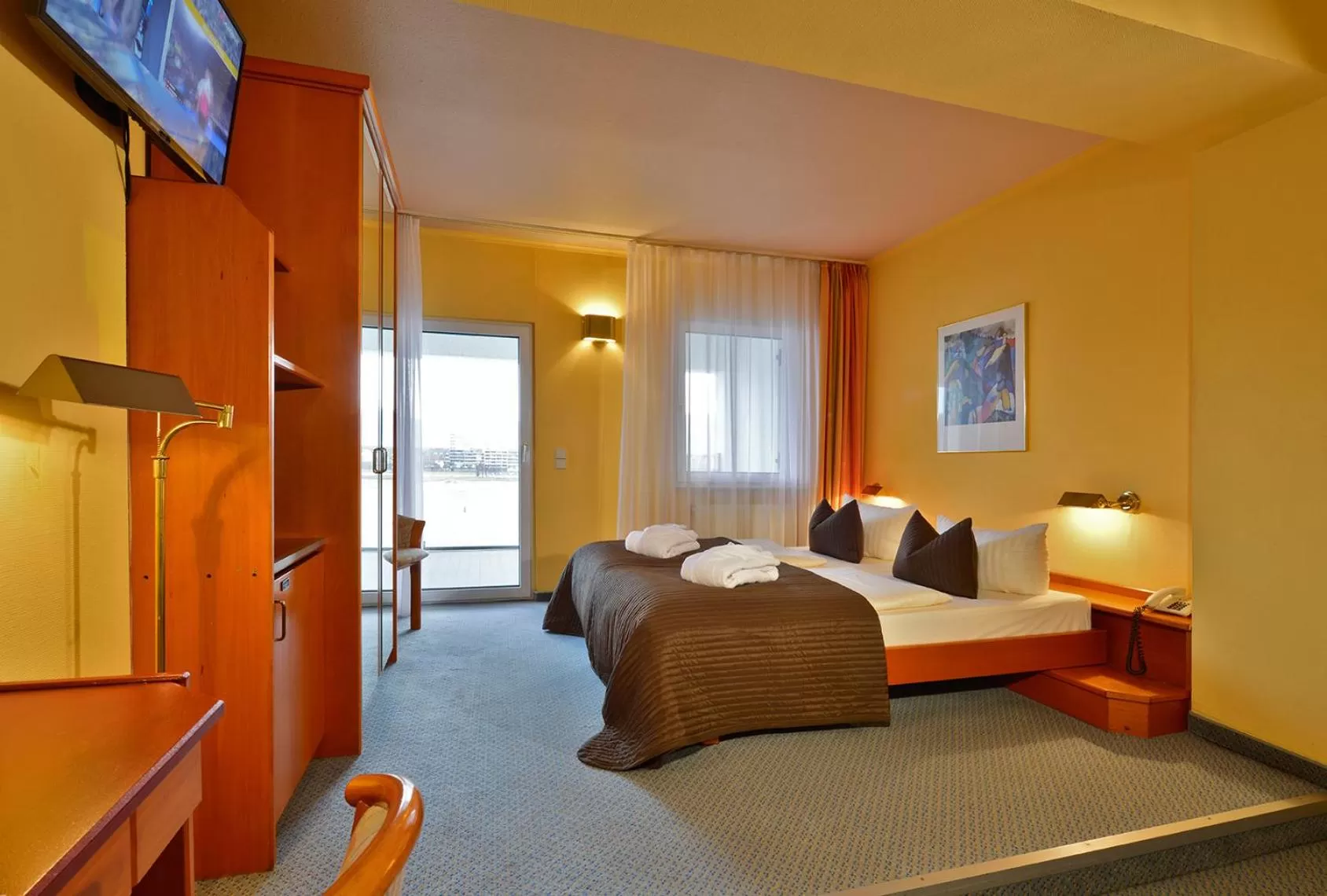 Bed in Rheinhotel Vier Jahreszeiten Bad Breisig