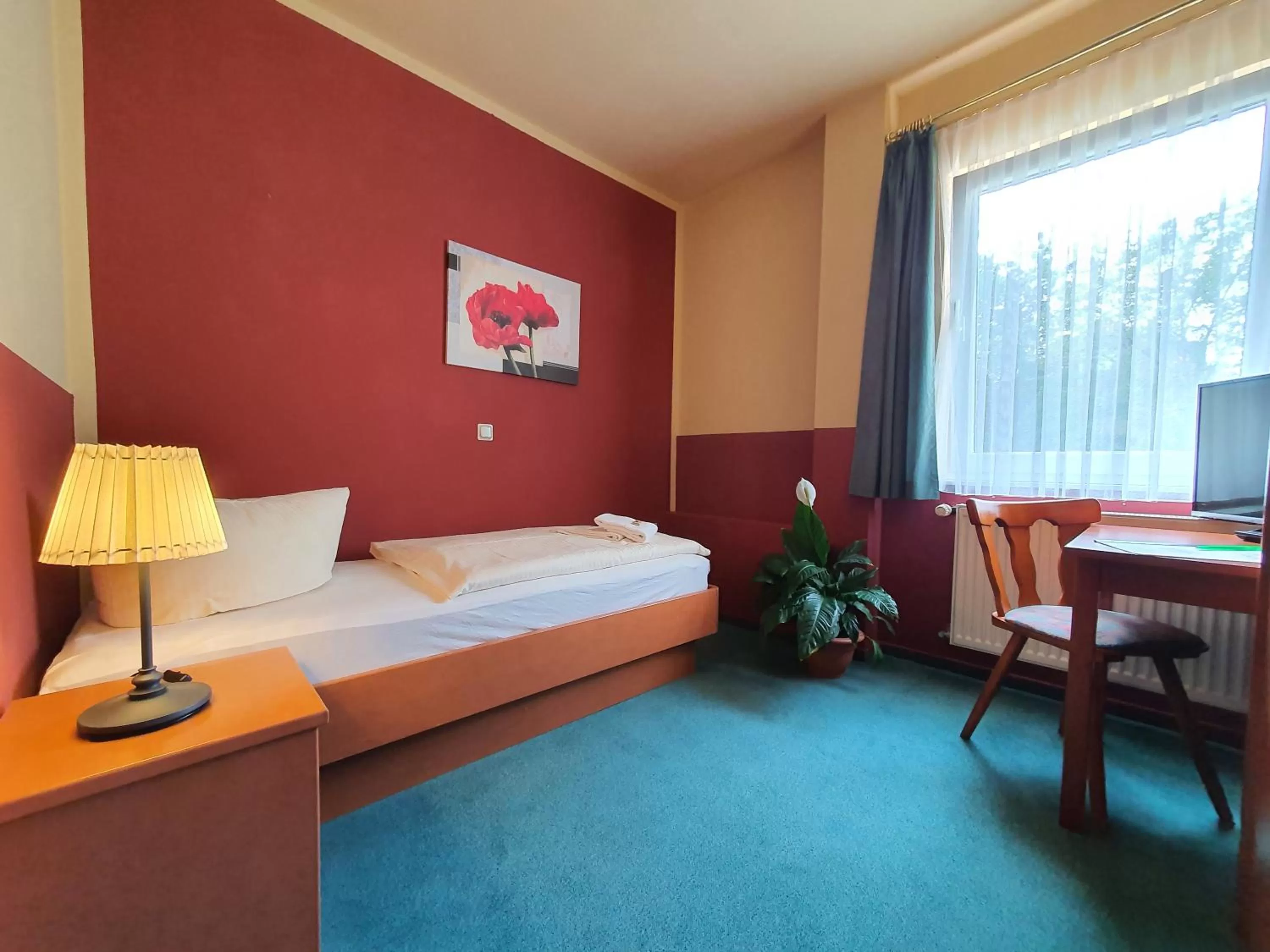 Bed in Altstadthotel Ilsenburg