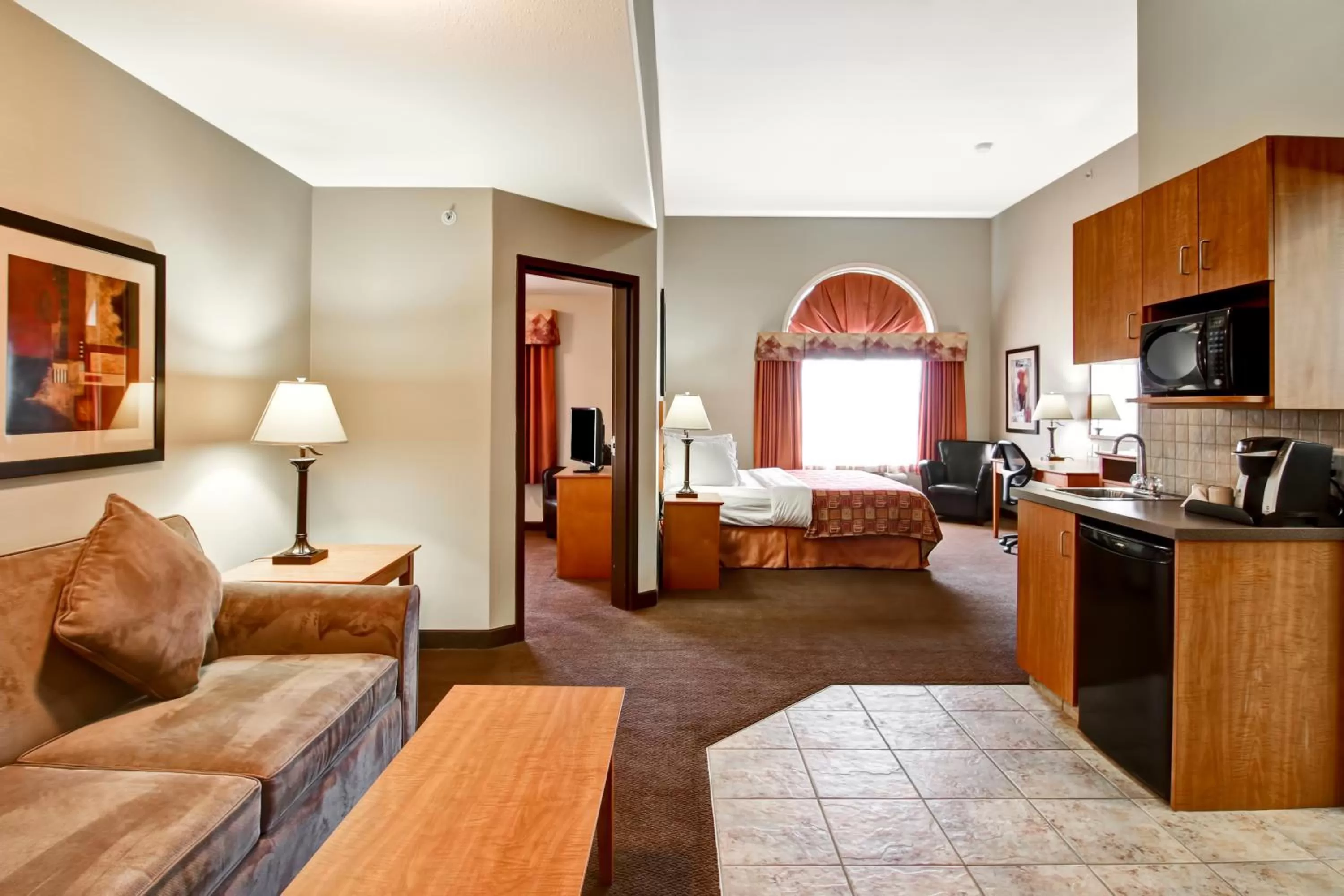 Living room, Bed in Canalta Rocky Mountain House