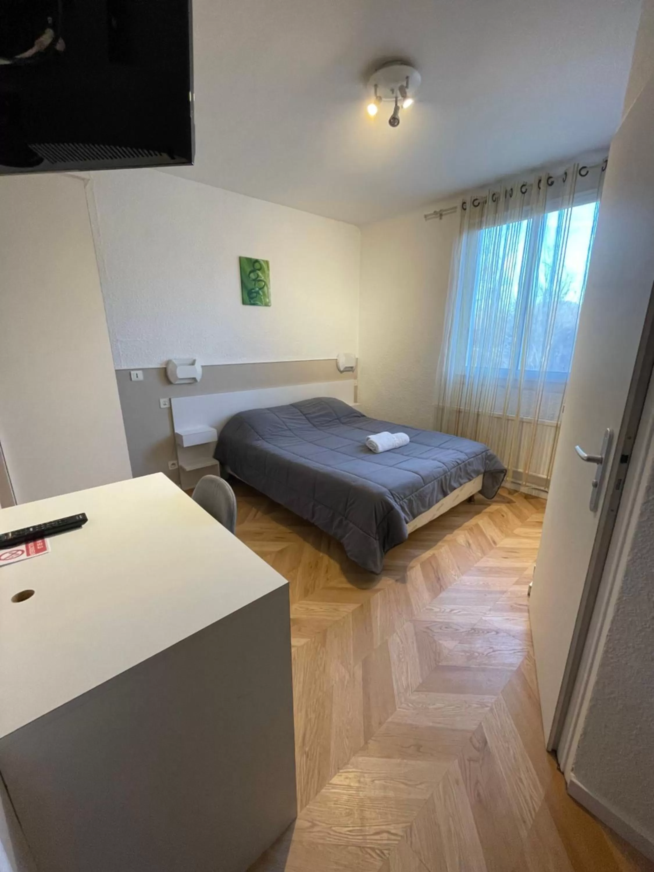 Bed in Hotel Les Chênes