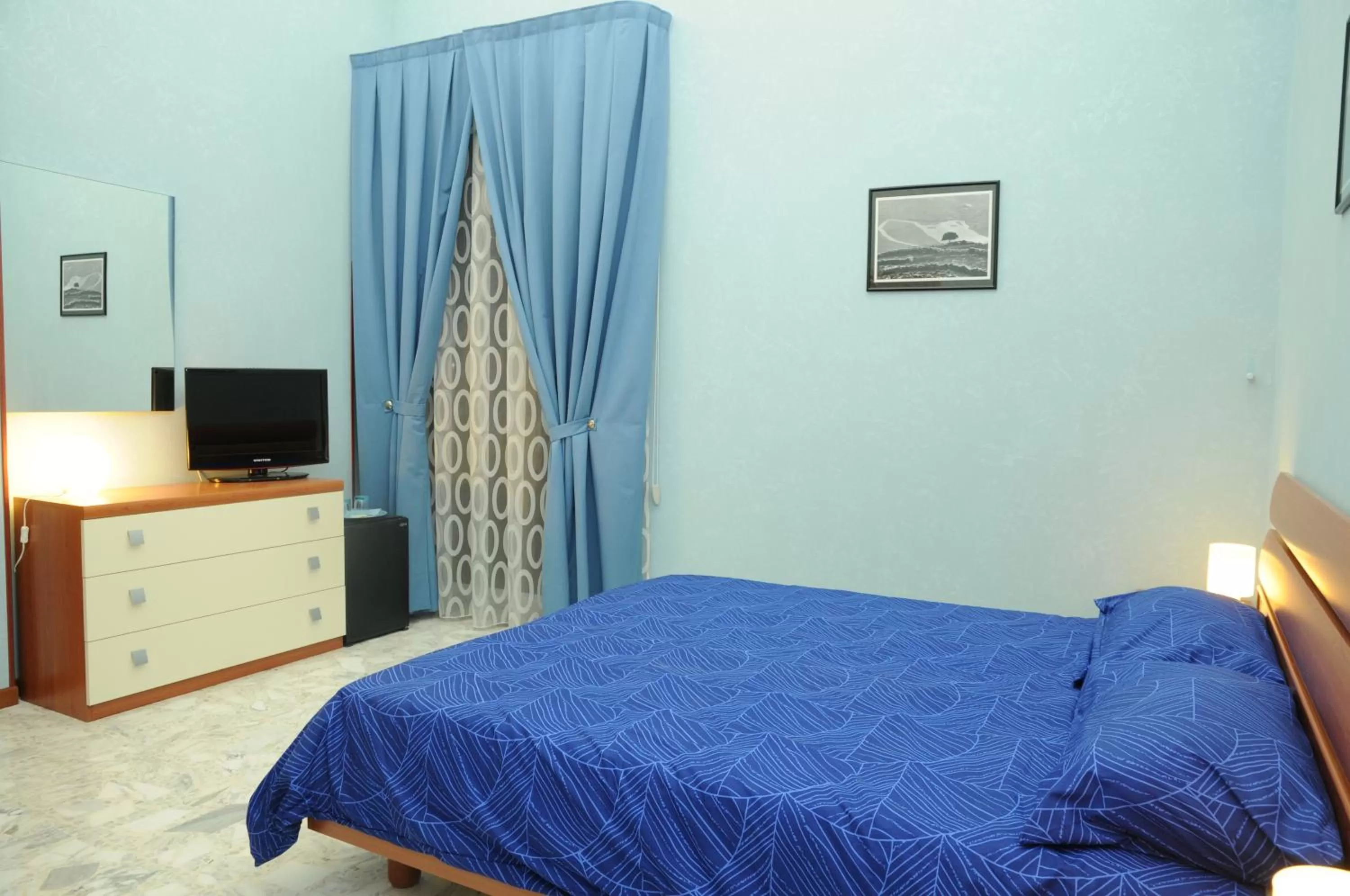 Bed in Affittacamere Conte Di Cavour