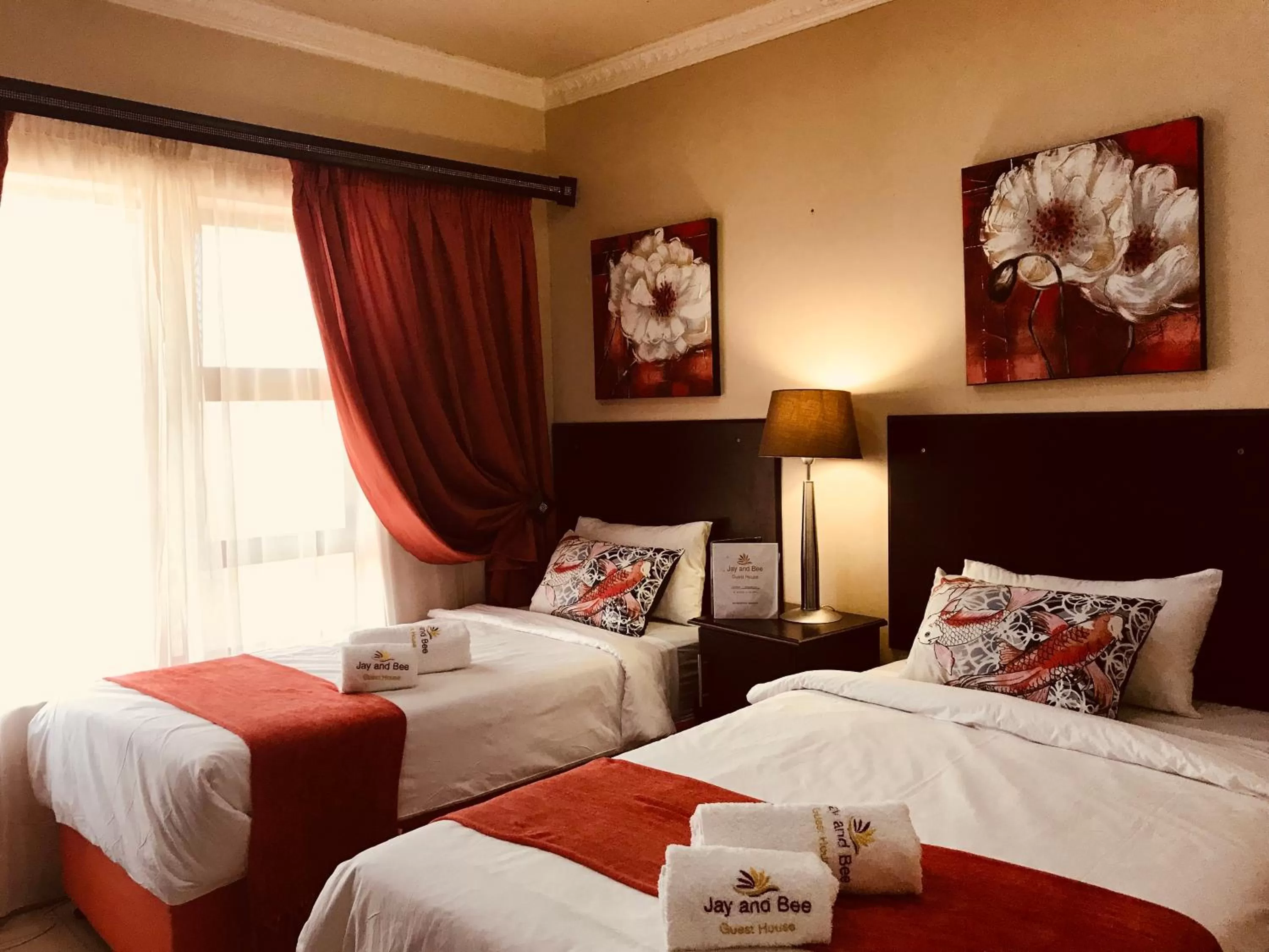 Bed in Jay and Bee Guesthouse