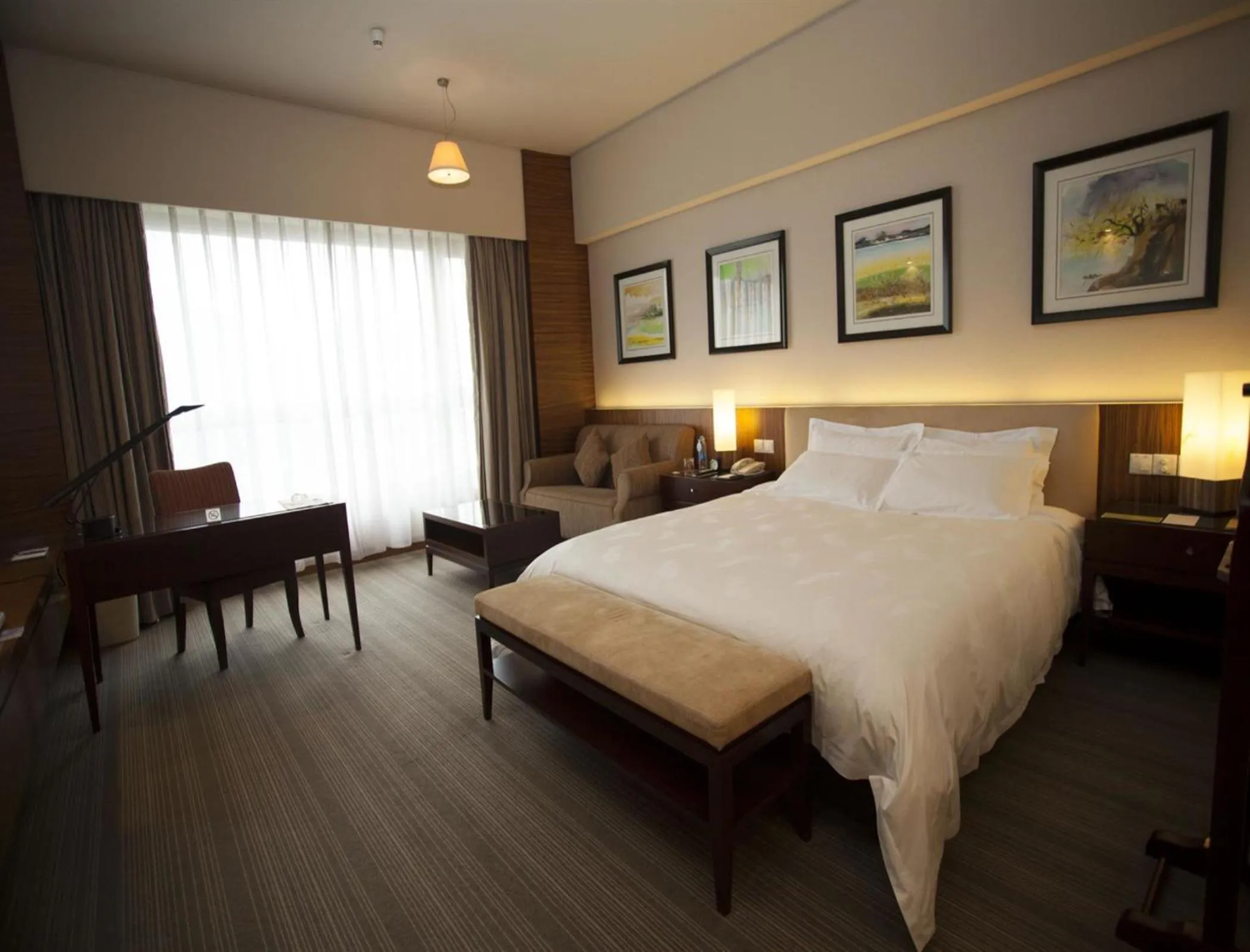 Bedroom in Parklane Hotel Changan