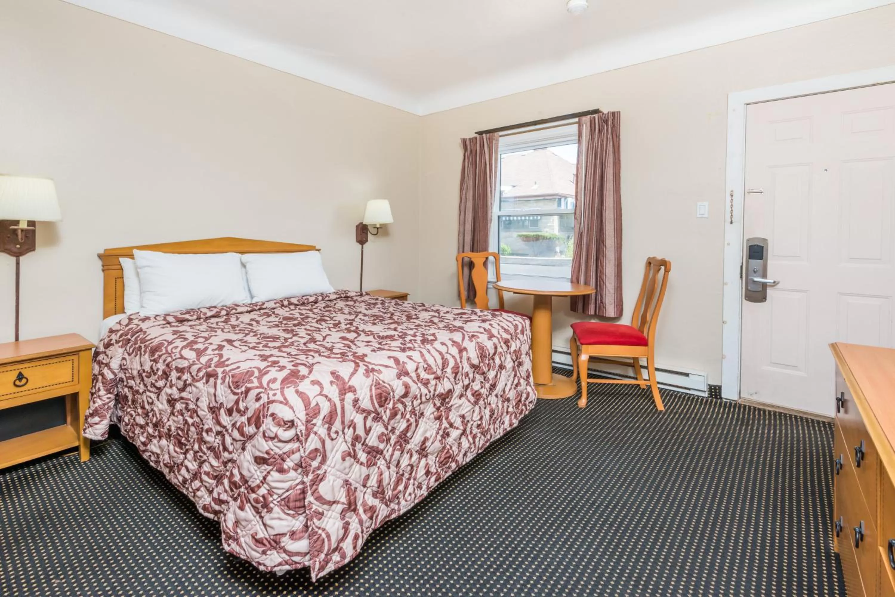 Day, Bed in Knights Inn London Ontario