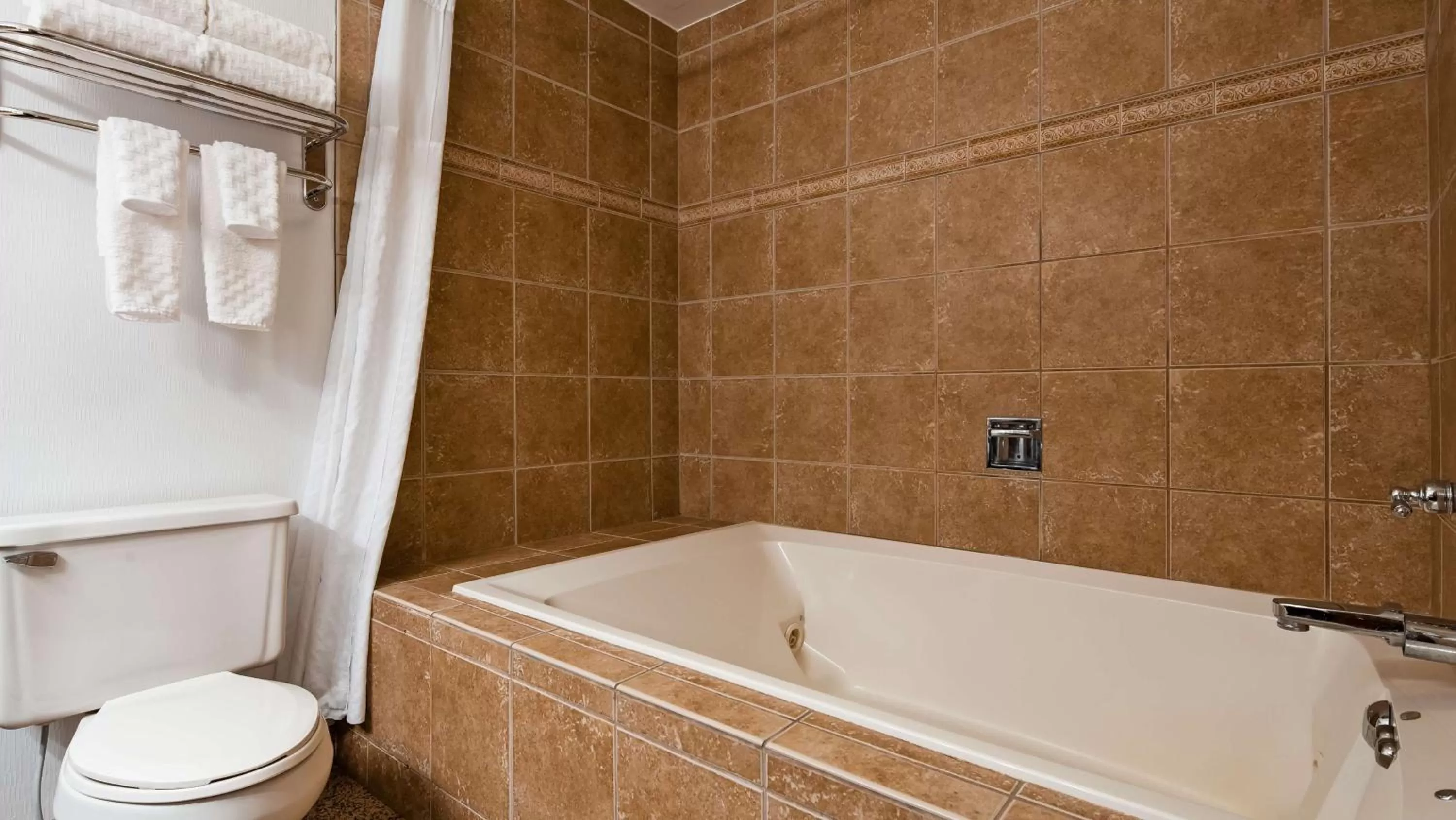 Suite with One King and Two Queen Beds  in Best Western Gaylord