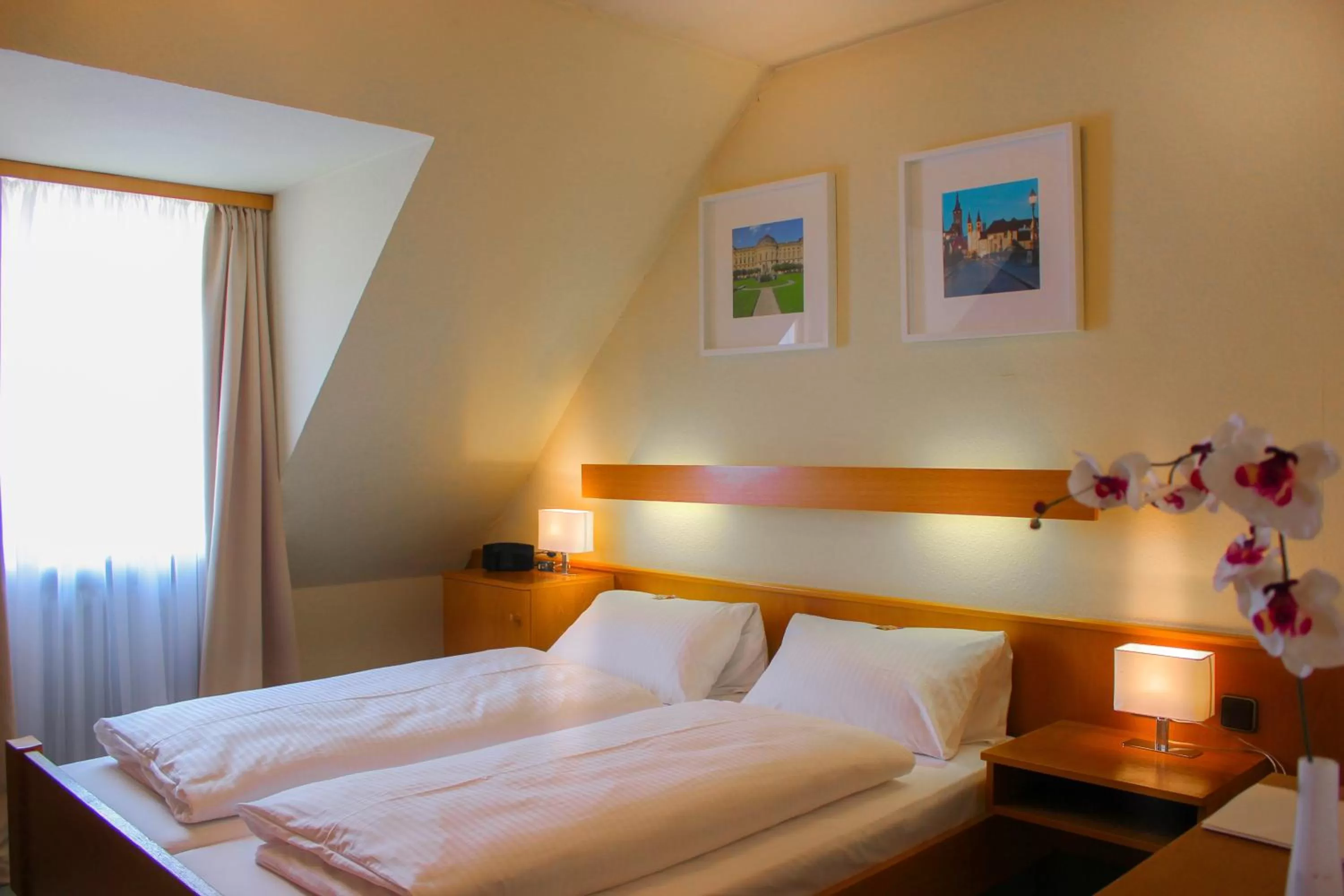 Bed in City Hotel Würzburg