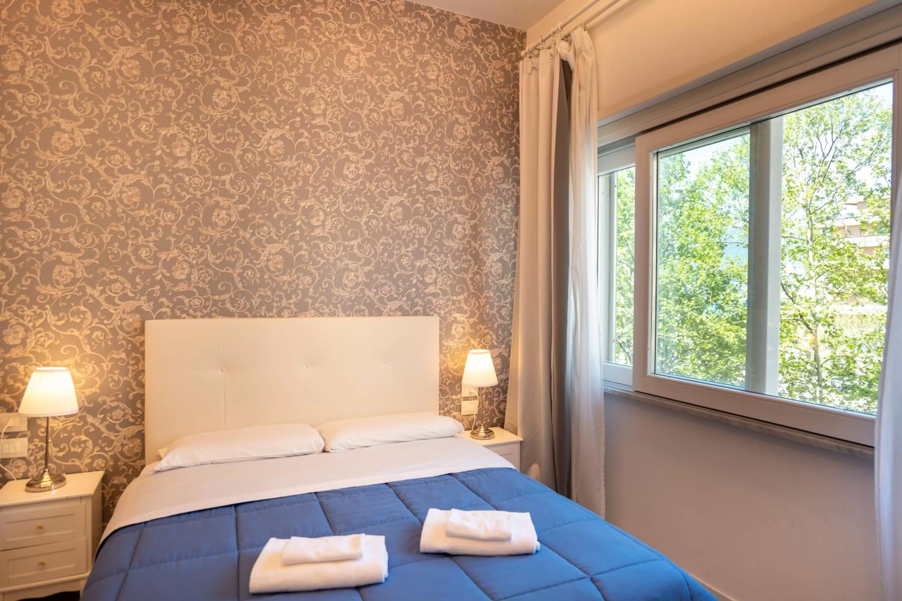 Bed in Relais Vittorio Veneto - Luxotel & Apartotel