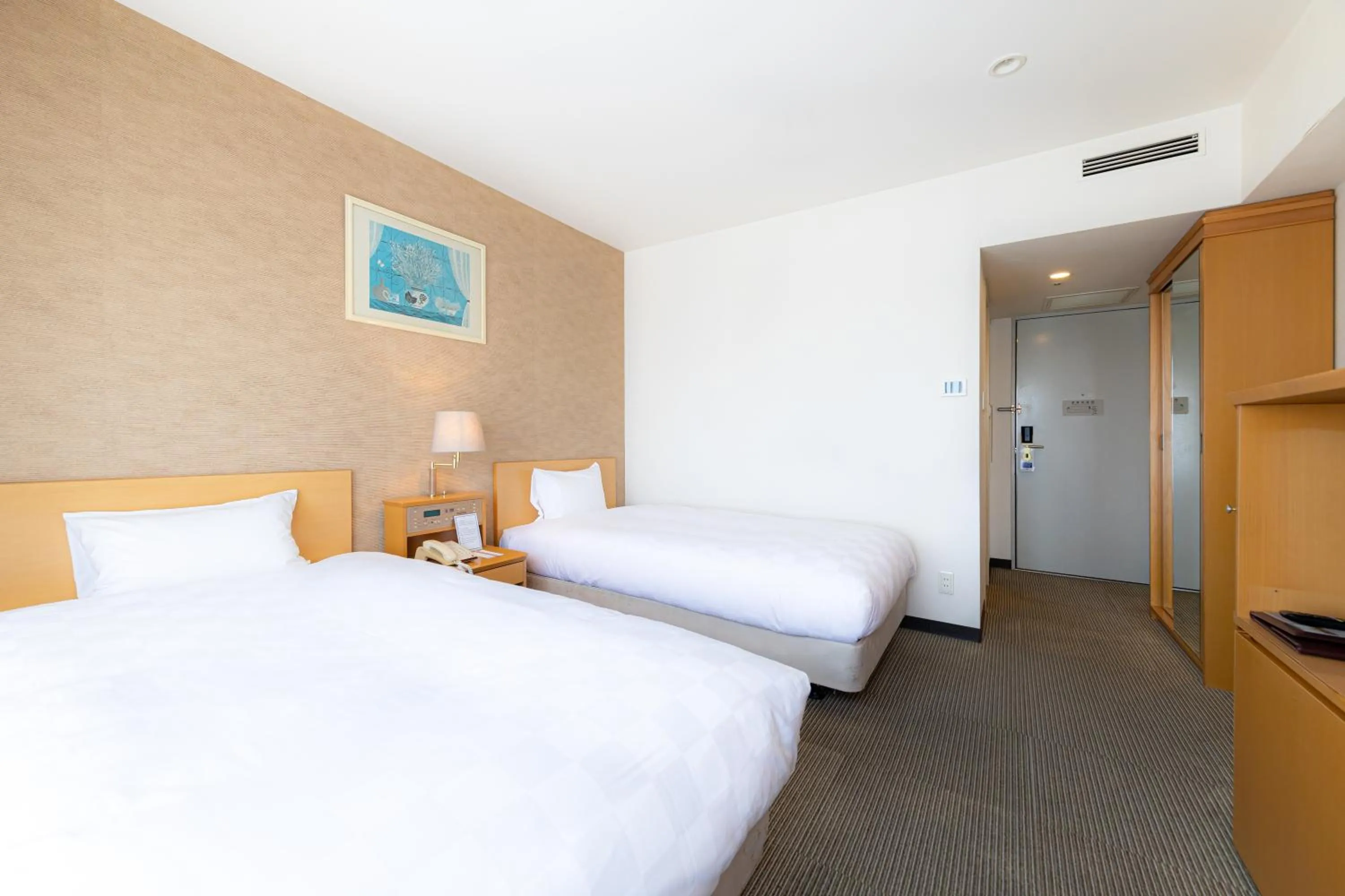 Bed in Bellevue Garden Hotel Kansai International Airport