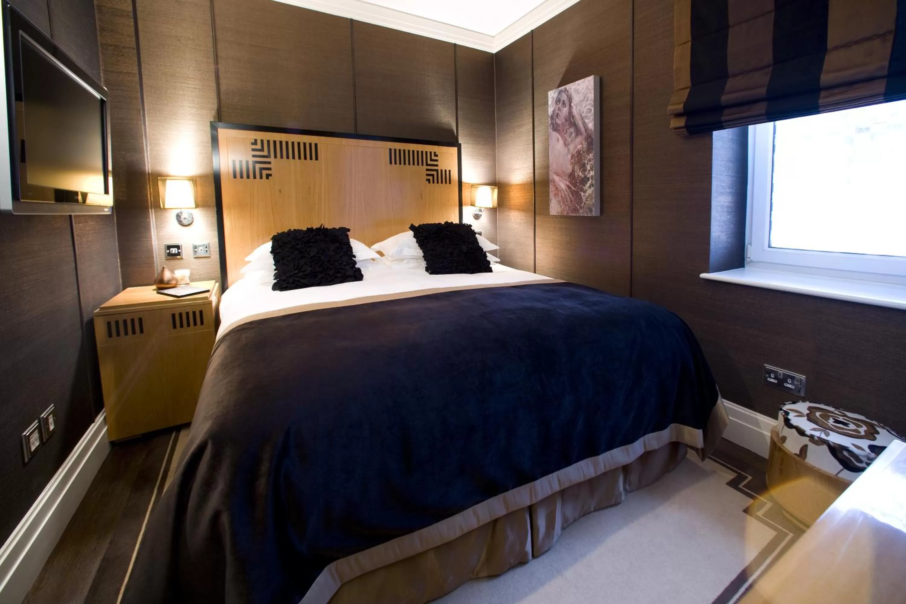 Bed in Karma Sanctum Soho Hotel