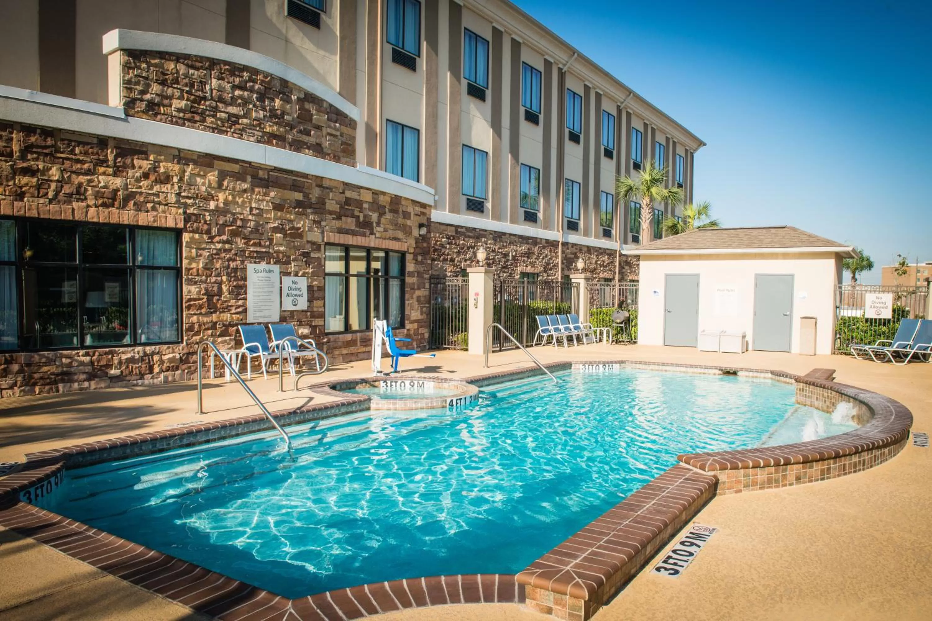 Swimming pool in Holiday Inn Express Hotel & Suites Houston NW Beltway 8-West Road by IHG