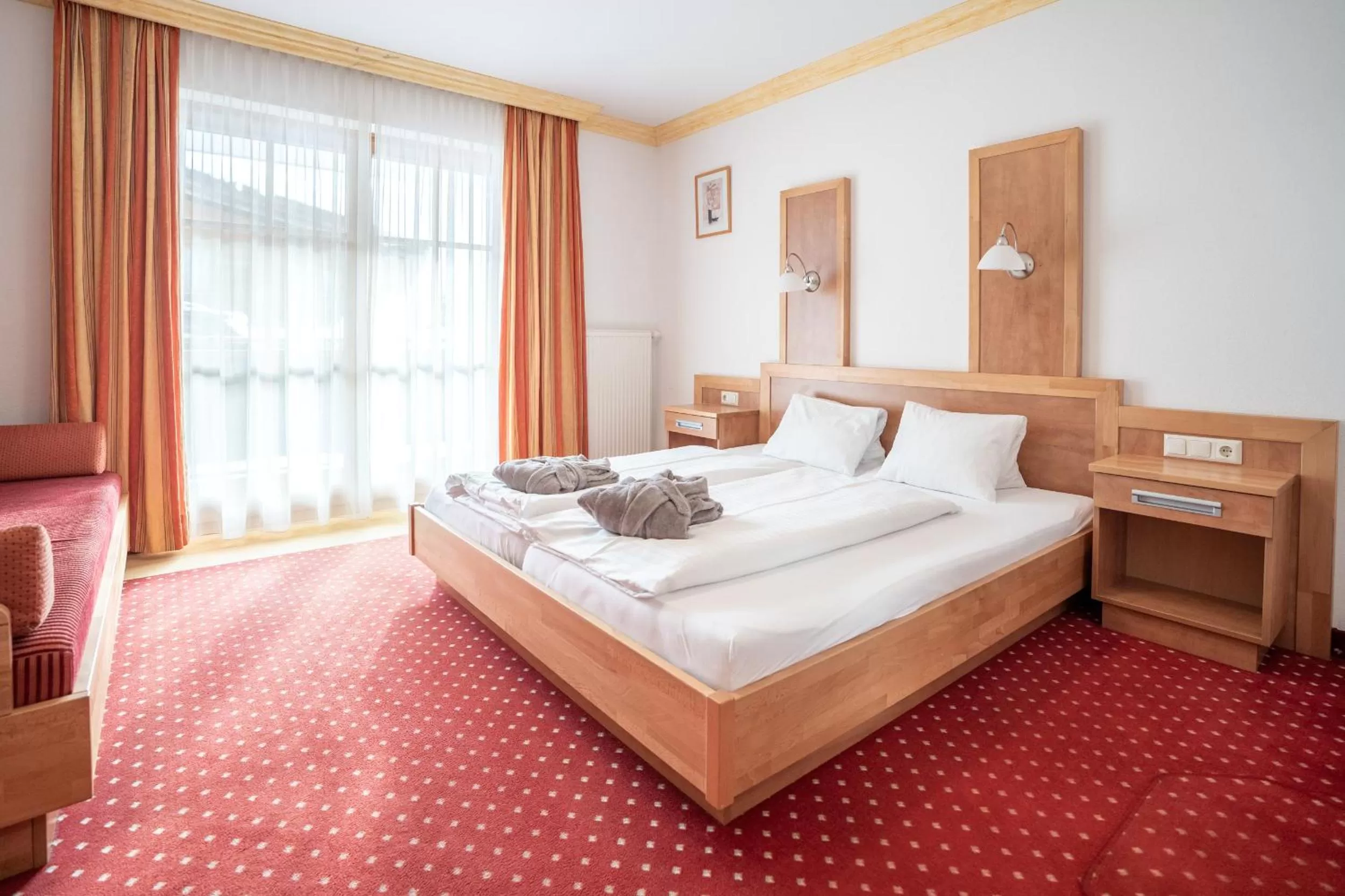 Bed in Hotel Astrid - Ski In - Ski Out